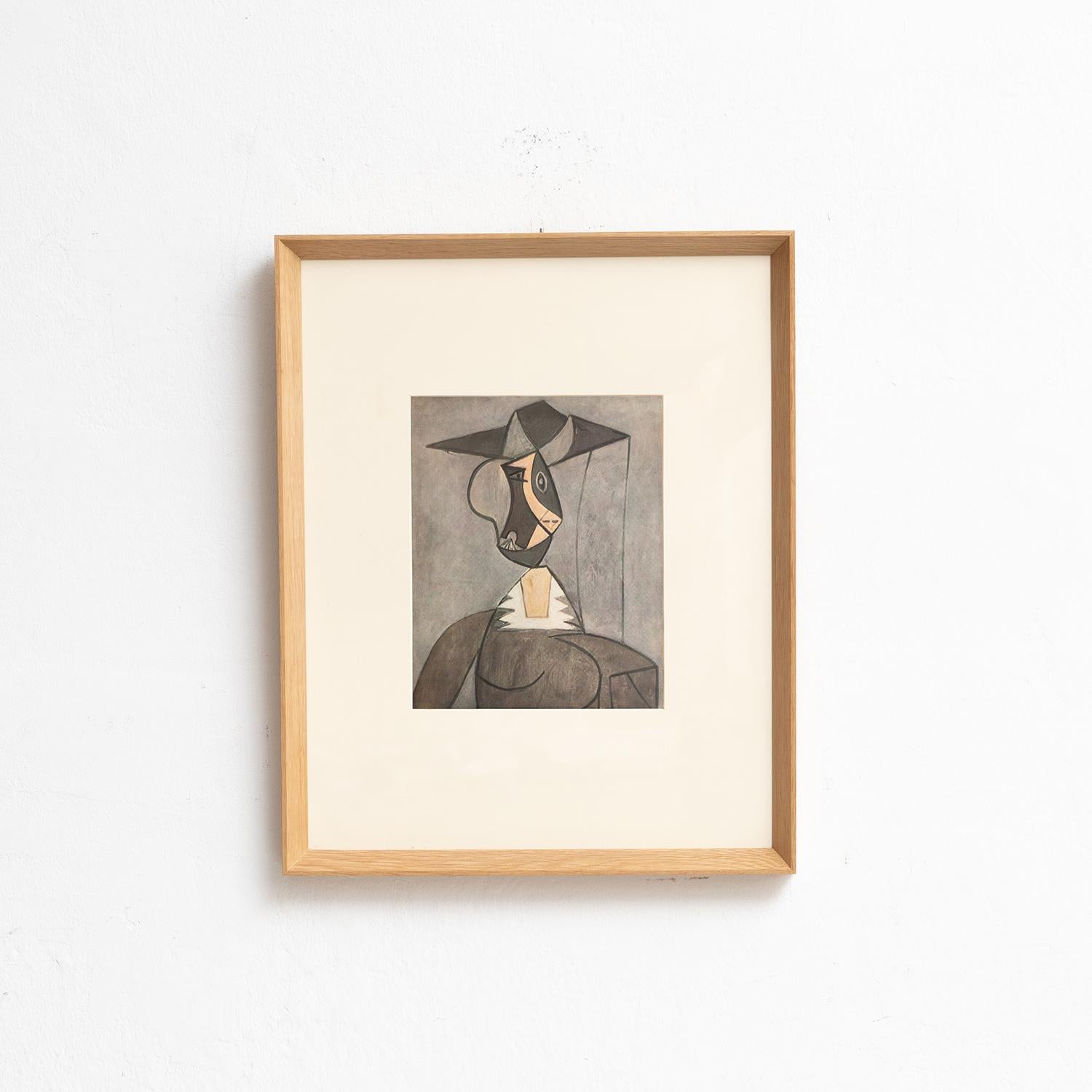 Entra nella brillantezza senza tempo di Pablo Picasso con questo straordinario cliché a colori, sapientemente edito dalle Editions du Chêne di Parigi, Francia, nel 1943. Adornato da una splendida cornice in legno massiccio che misura 54 cm di