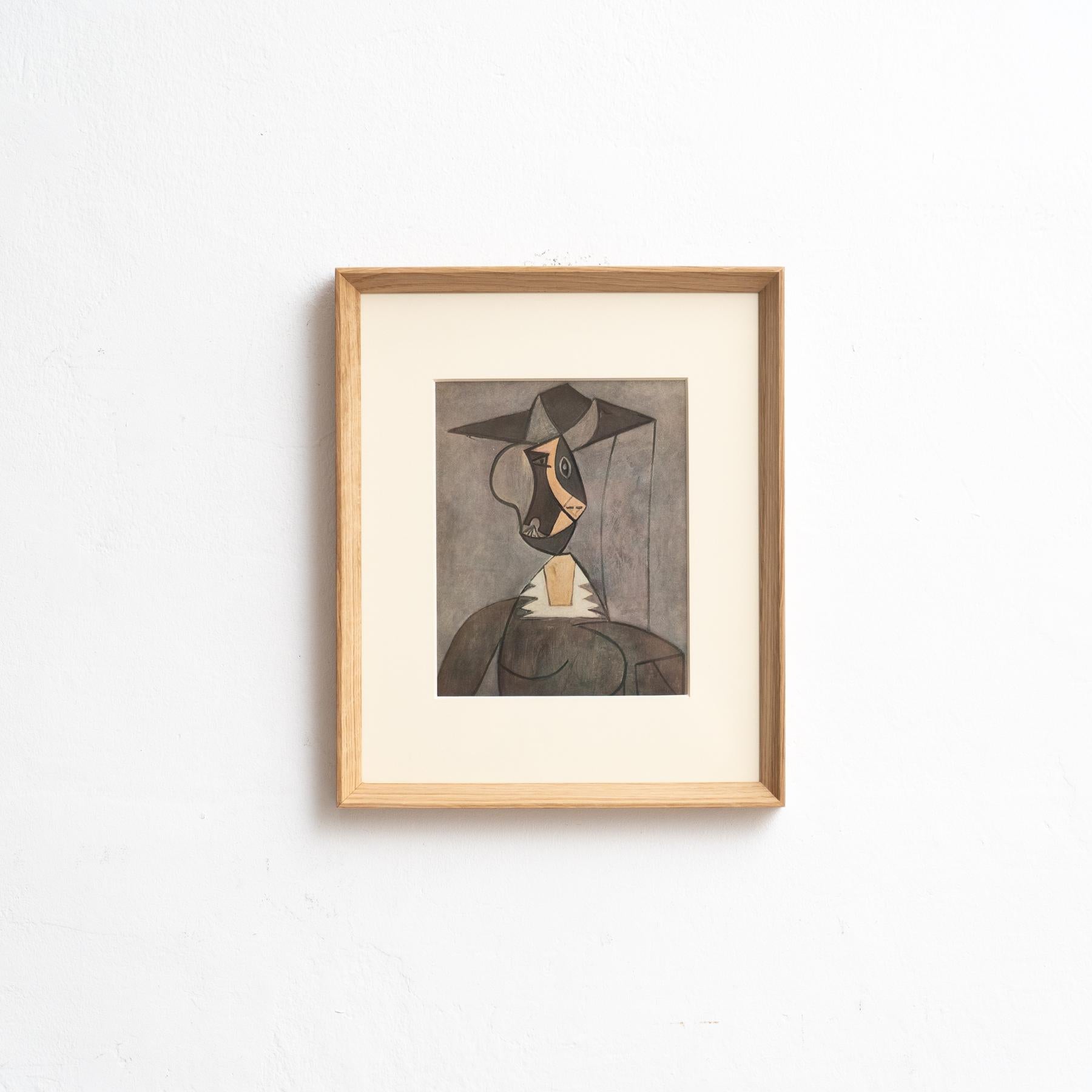 Entra nella brillantezza senza tempo di Pablo Picasso con questo straordinario cliché a colori, sapientemente edito dalle Editions du Chêne di Parigi, Francia, nel 1943. Adornato da una splendida cornice in legno massiccio, questo cliché a colori