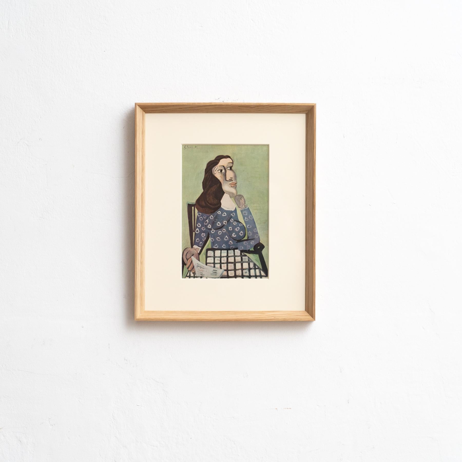 Entra nella brillantezza senza tempo di Pablo Picasso con questo straordinario cliché a colori, sapientemente edito dalle Editions du Chêne di Parigi, Francia, nel 1943. Adornato da una splendida cornice in legno massiccio, questo cliché a colori