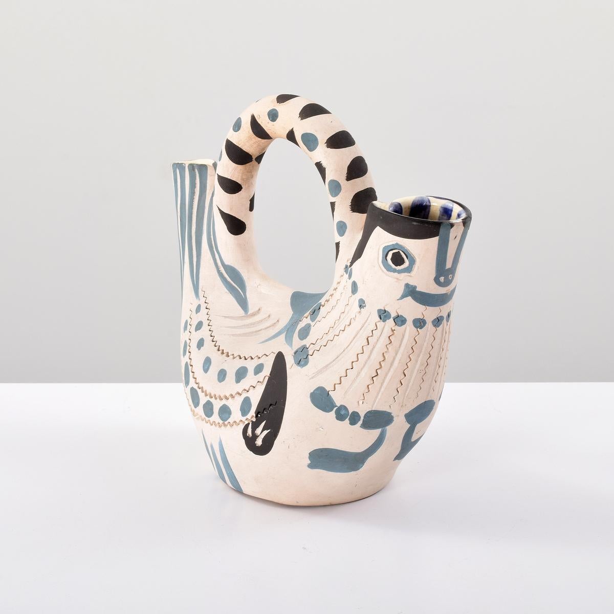 Pichet Espagnol vessel by Pablo Picasso (1881-1973). Work was conceived in 1954 and executed in a numbered edition of 300.

Markings: stamped, marked and numbered (Edition Picasso, 60/300, Madoura, Edition Picasso (underneath glaze), Madoura Plein