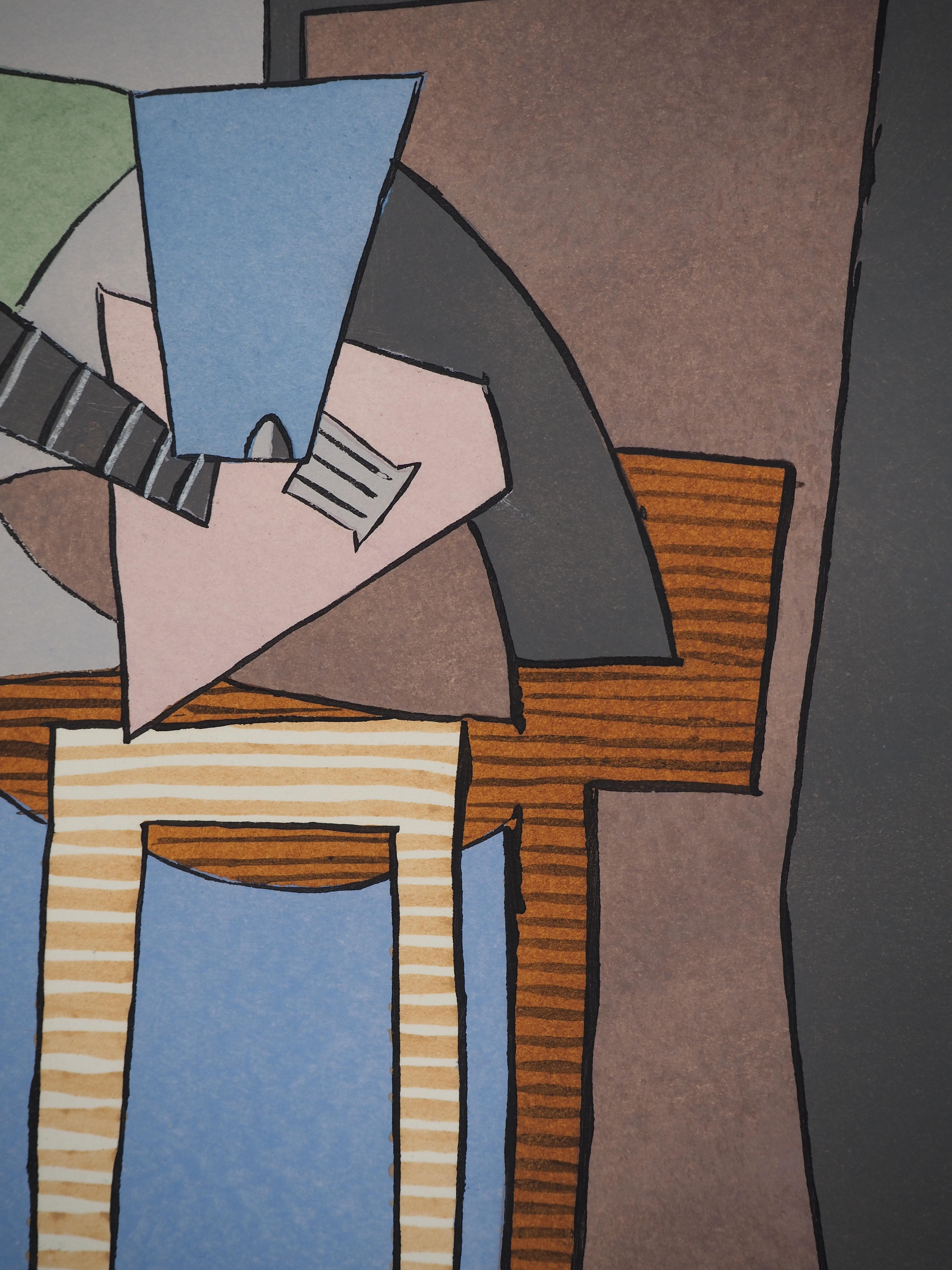 Pablo Picasso (after) Pablo Picasso (después)
Mesa y guitarra cubistas, 1926

Litografía y estarcido (Atelier Ducros et Colas)
Firma impresa en la placa
Fechado en la placa 1920
Edición limitada a 750 ejemplares sin numerar
Sobre vitela 28 x 22 cm