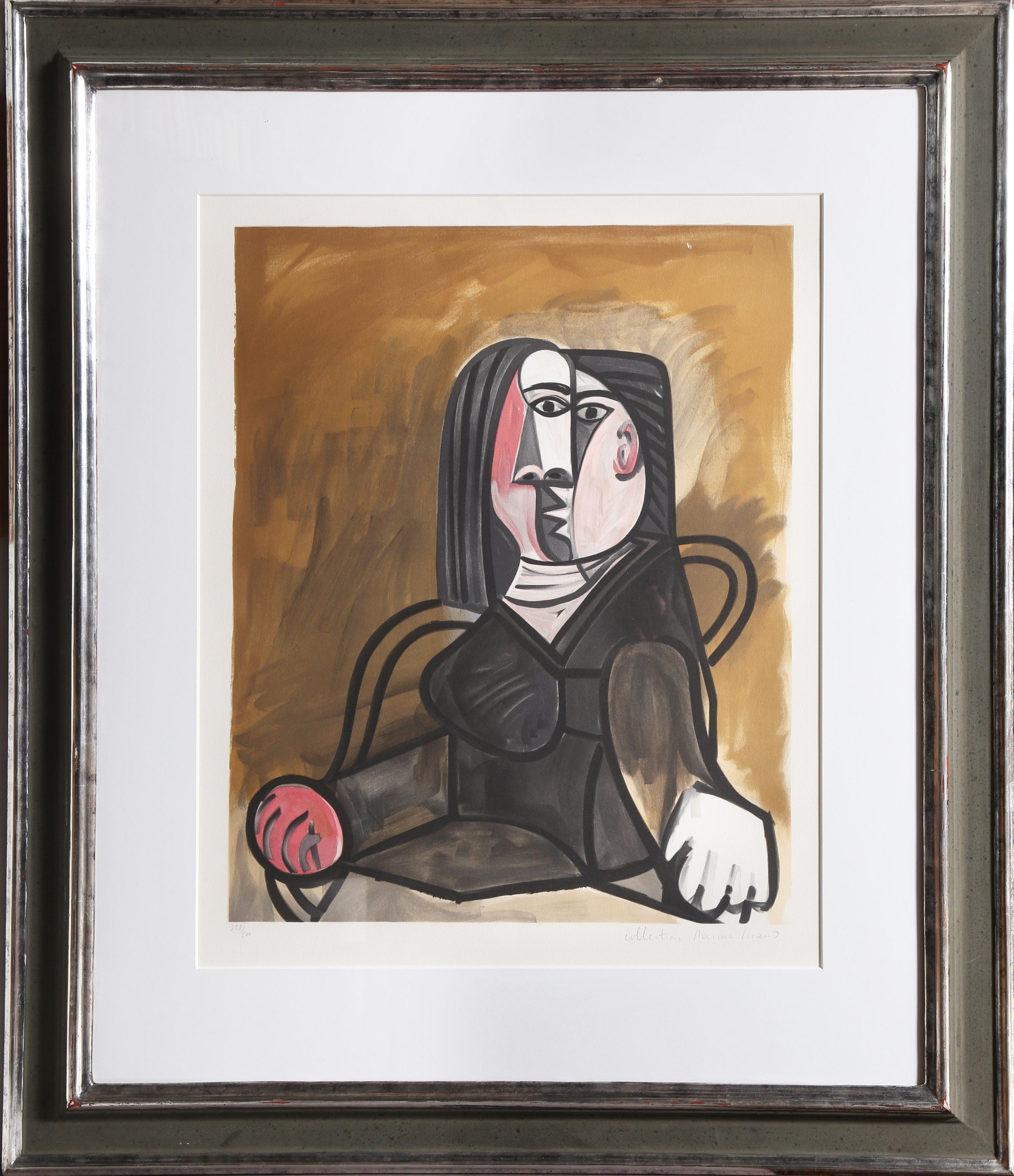 Seated in an armchair, the woman in this Pablo Picasso print appears fragmented and disjointed due to the artist’s integration of multiple perspectives. A lithograph from the Marina Picasso Estate Collection after the Pablo Picasso artwork "Femme
