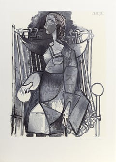Vintage Femme Assise dans un Fauteuil Tresse