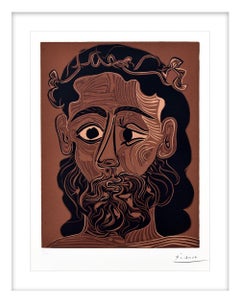 Homme barbu couronné feuilles de vigne