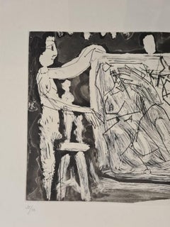 In the studio: two models with a large canvas and sculptures