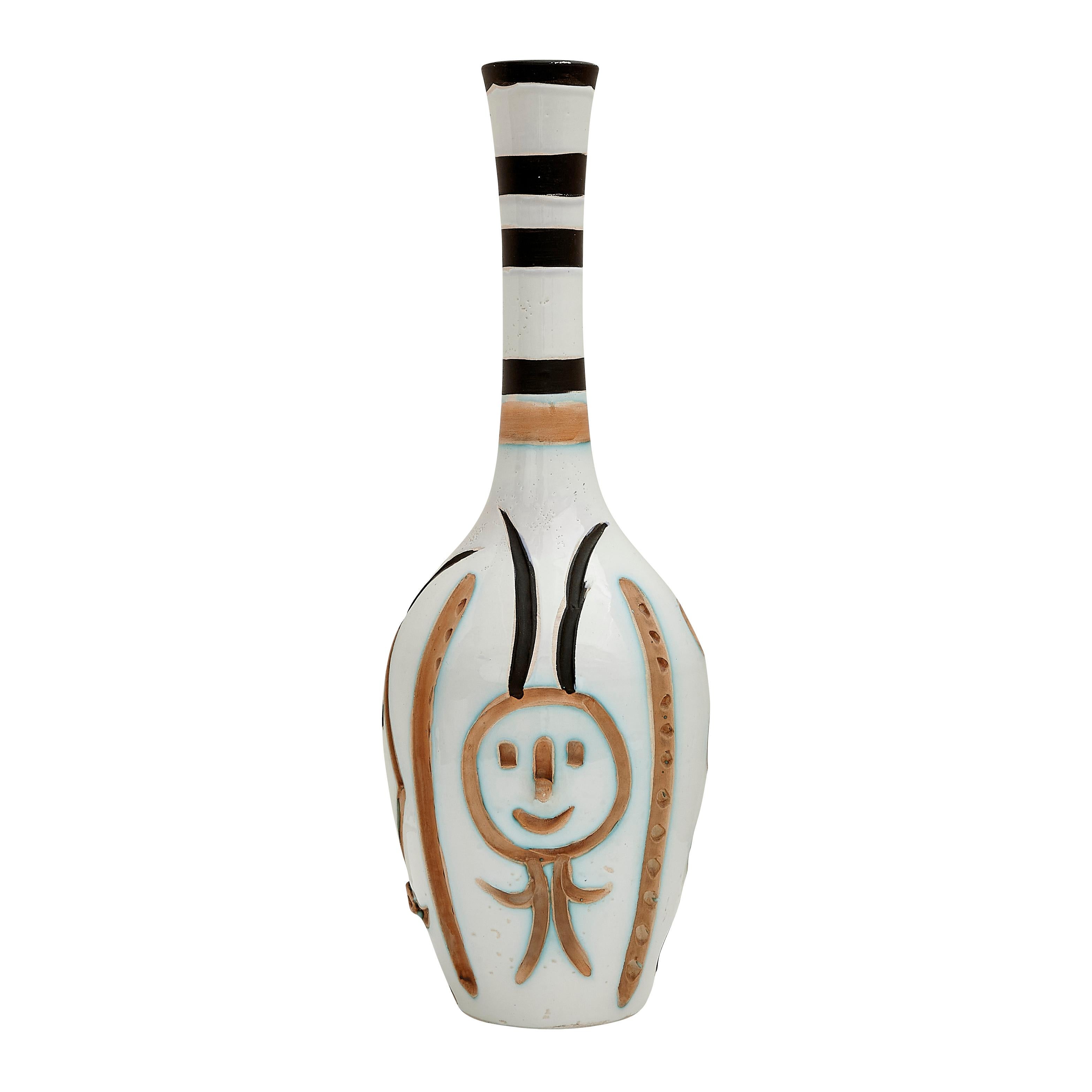 PABLO PICASSO (1881-1973)
Bouteille gravée (A. R. 249)

Terre de faïence vase, painted and partially glazed, 1954, 172/300 and inscribed 'Edition Picasso', with the d'après Picasso and Madoura stamps.
