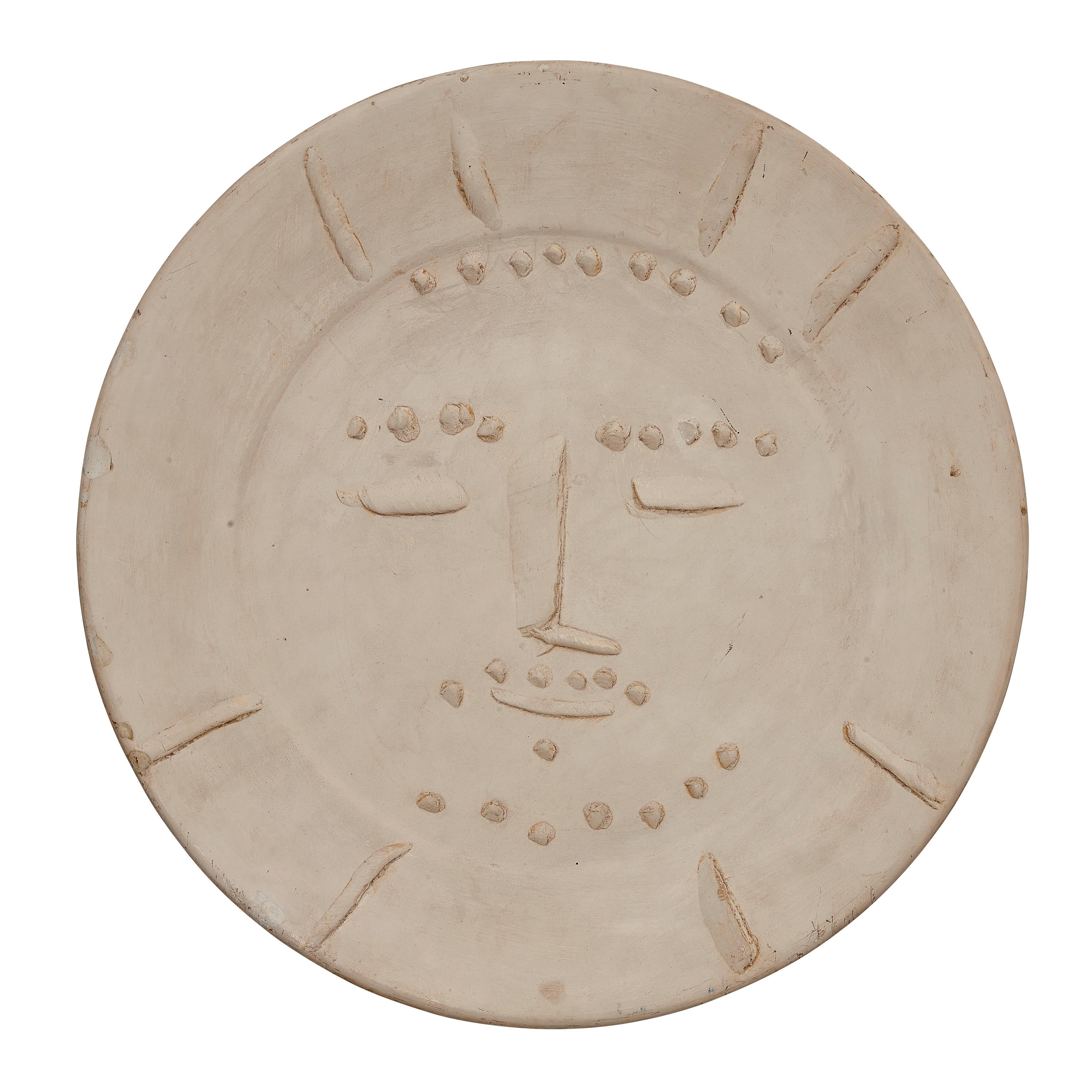 PABLO PICASSO (1881-1973) 
Dormeur (A. R. 343)

Terre de faïence plate, 1956, an unnumbered example aside from the edition of 100, this plate was used as the mold for Ateliers Hugo's creation of the corresponding repoussée silver plate, with the