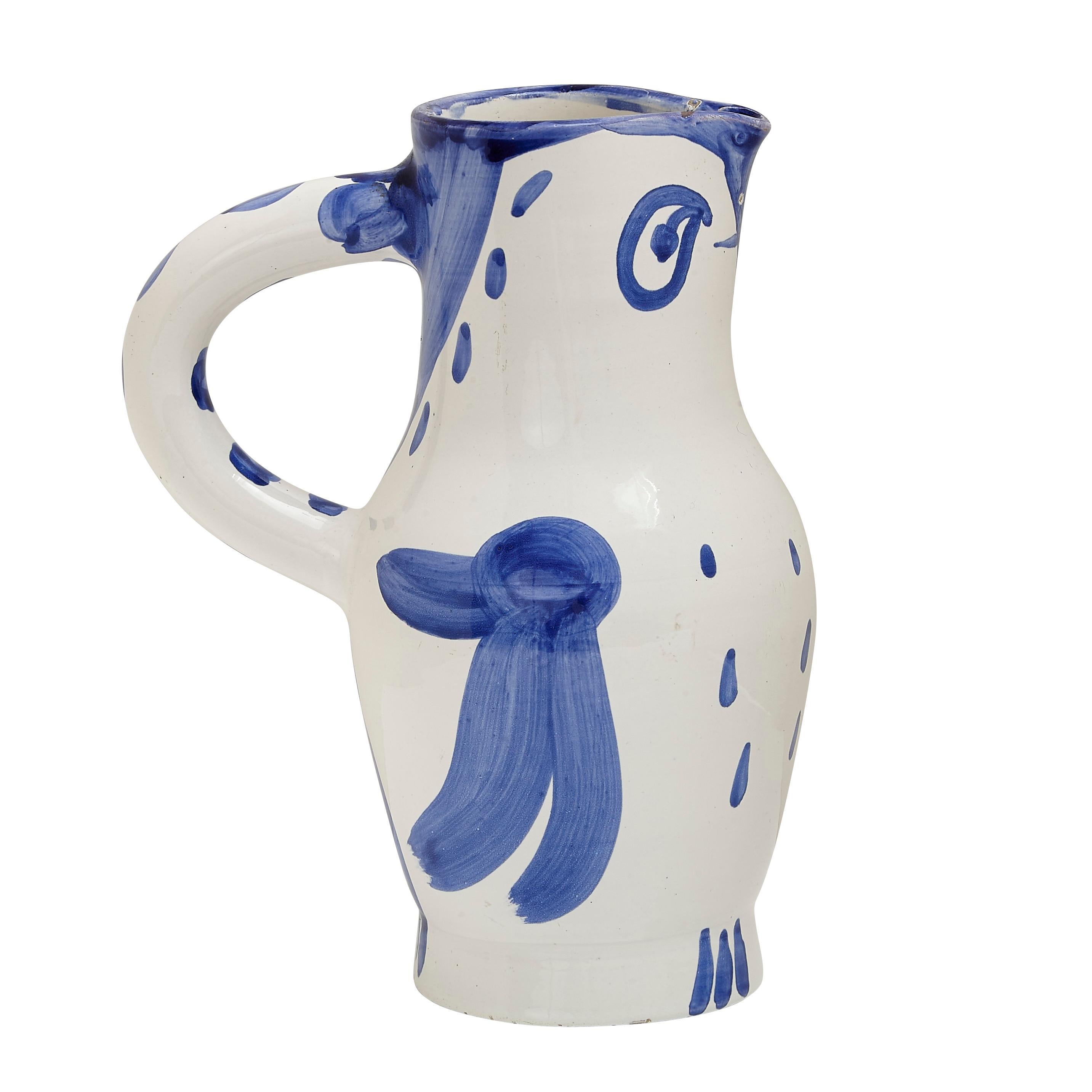PABLO PICASSO (1881-1973) 
Hibou (A. R. 253) 

Terre de faïence pitcher, painted in colors and glazed, 1954, from the edition of 500, inscribed 'Edition Picasso' and 'Madoura', with the Edition Picasso and Madoura stamps.