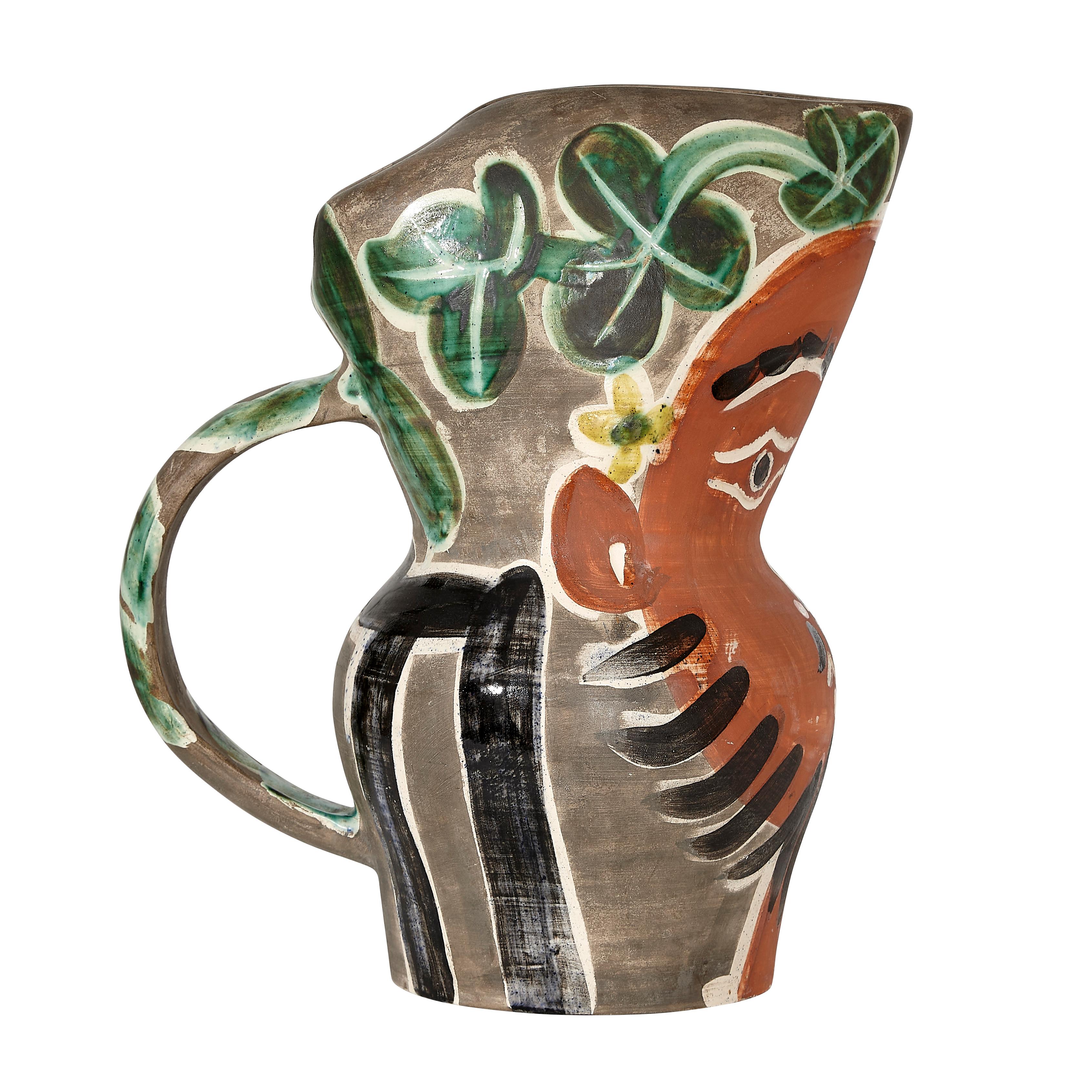 PABLO PICASSO (1881-1973)
Le barbu (A. R. 217)

Terre de faïence pitcher, painted in colors and partially glazed, 1953, from the edition of 500, inscribed 'Edition Picasso' and 'Madoura', with the Edition Picasso and Madoura stamps.