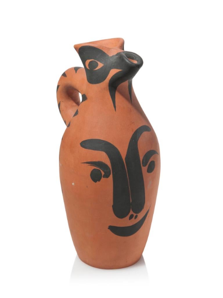 This Picasso pitcher "Yan visage, Ramié 512" is one in an edition of 300 and is made of white earthenware clay, and decorated with colored engobes and glaze.  It is signed and numbered on the base of the pitcher.

Please contact us with any