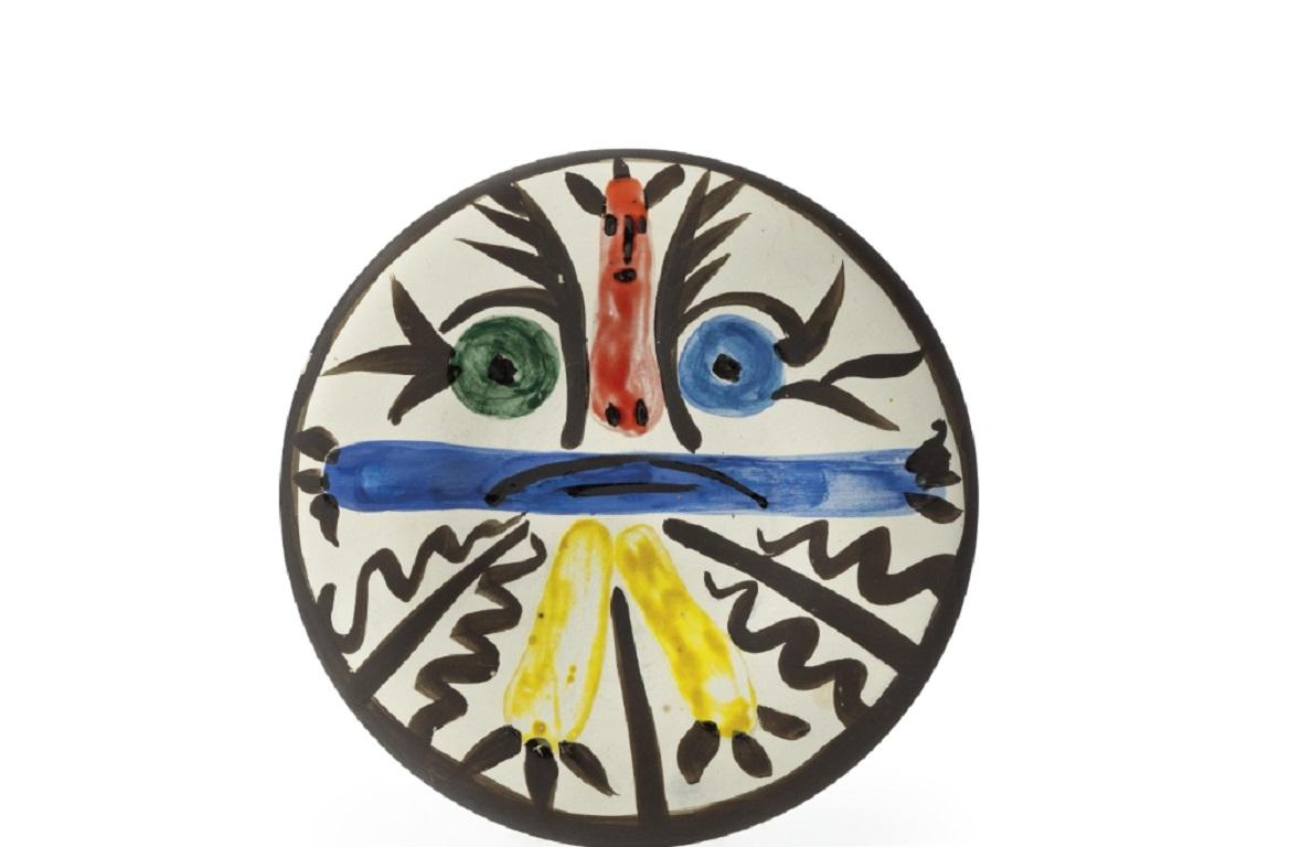 This Picasso ceramic plate "Personnages no. 28 Ramié 463" is one in an edition of 150 and is made of white earthenware clay, and decorated with colored engobes and glaze. 

Please contact us with any questions.
