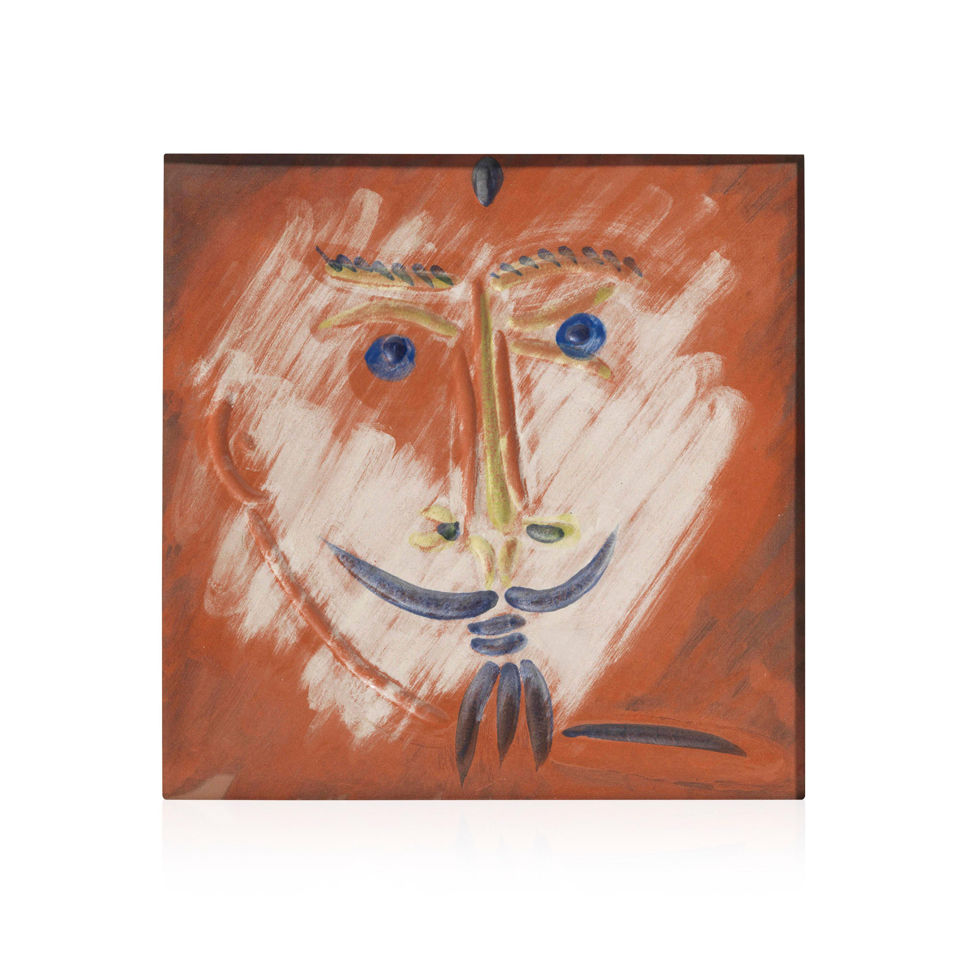 This Picasso ceramic tile "Visage à la Barbiche Ramié 601" is one in an edition of 100 and is made of white earthenware clay, and decorated with colored engobes and glaze. 

Please contact us with any questions.