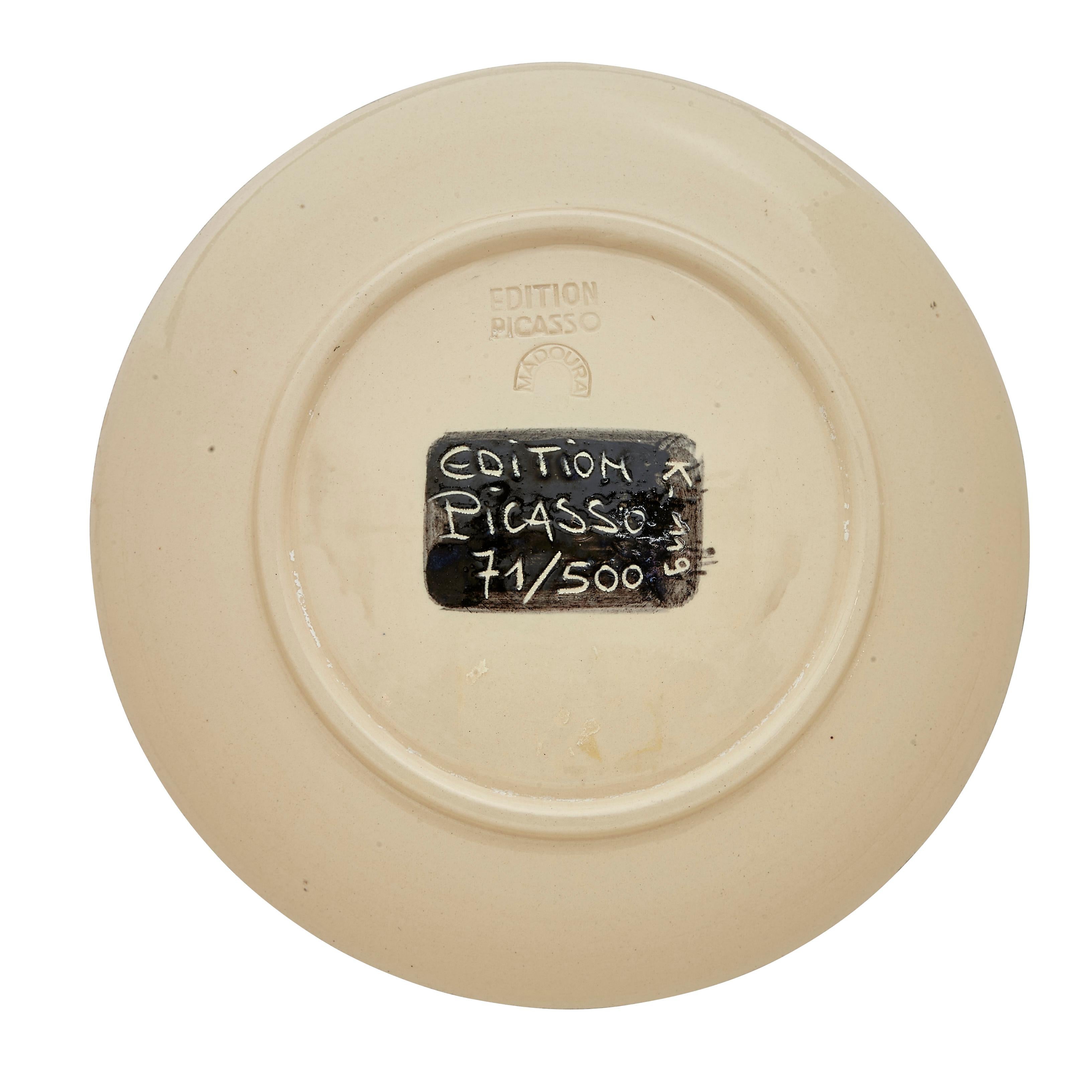 PABLO PICASSO (1881-1973) 
Motif spiralé (A. R. 404)

Terre de faïence plate, 1957, numbered 71/500, with the workshop numbering, incised 'Edition Picasso' and 'Madoura', partially painted, with the Edition Picasso and Madoura stamps.
