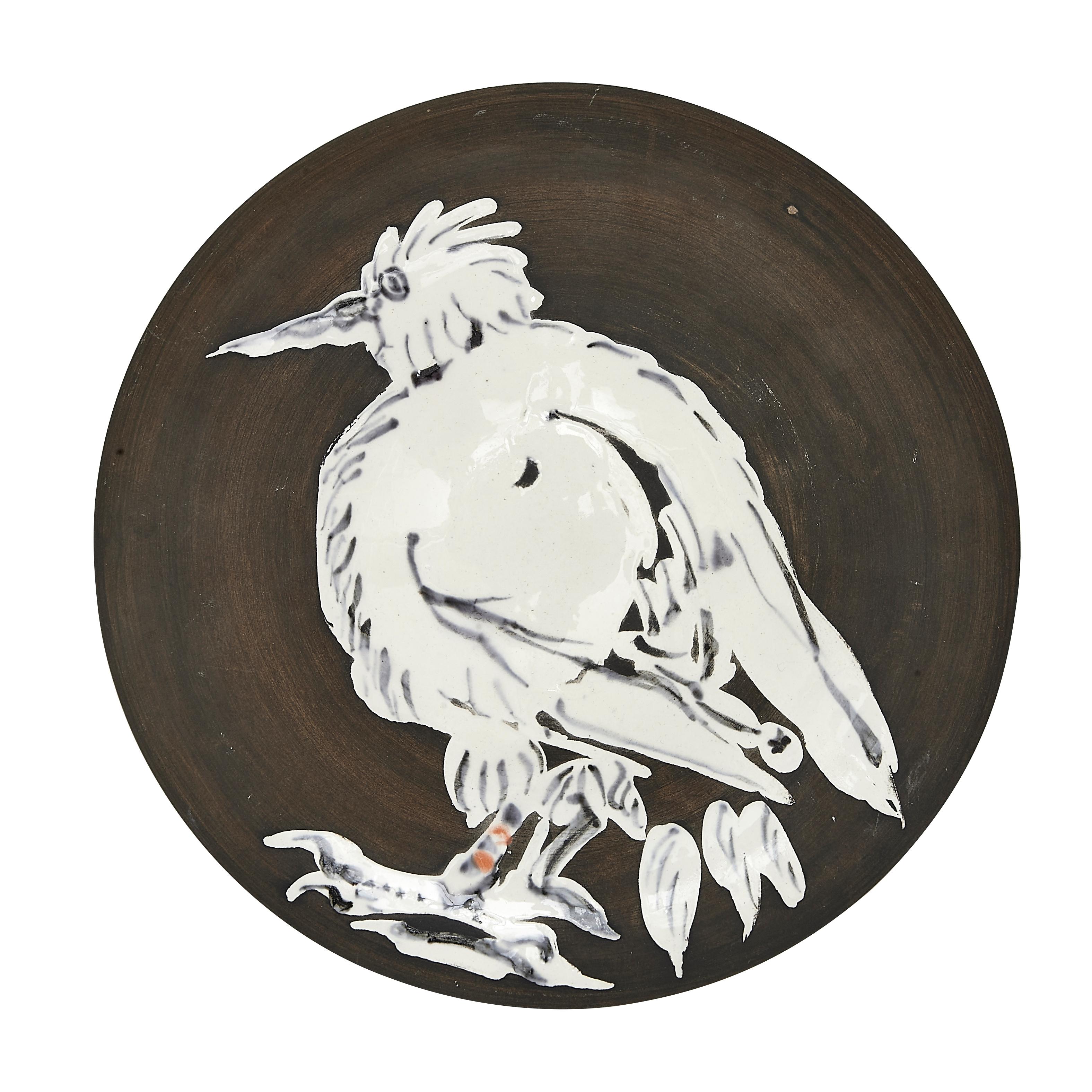 PABLO PICASSO (1881-1973) 
Oiseau No. 76 (A. R. 481)

Terre de faïence plate, painted in colors and partially glazed, 1963, numbered 116/200 and inscribed 'No 76', 'Edition Picasso' and 'Madoura'