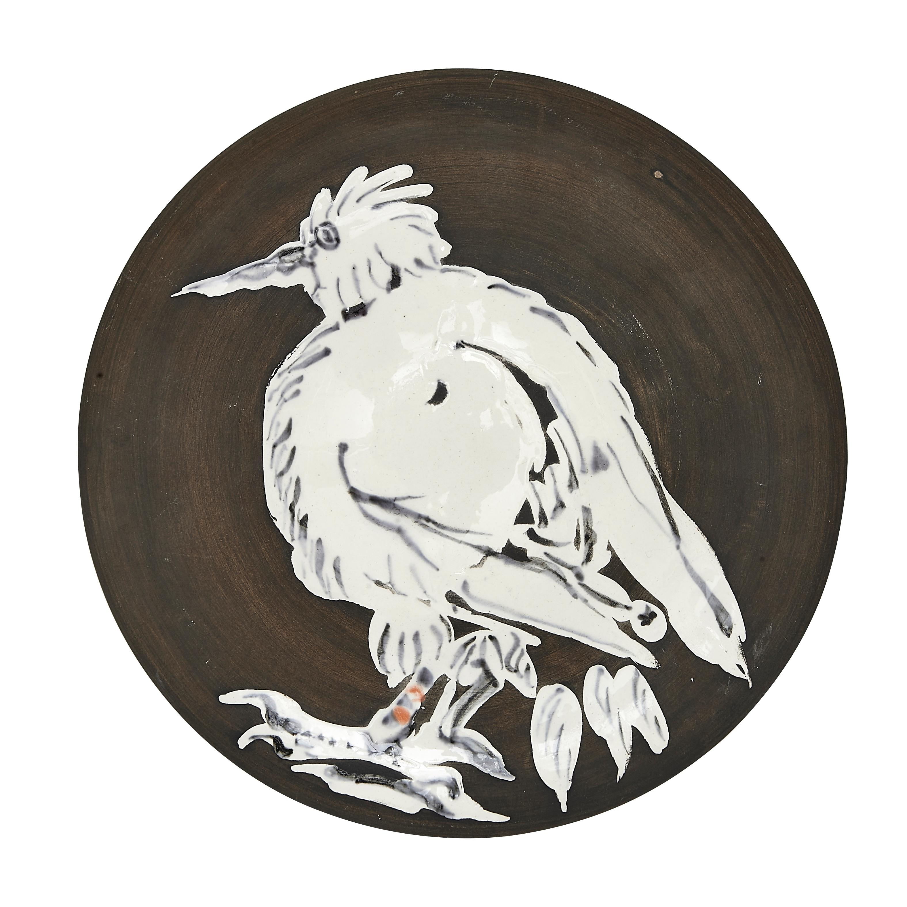 PABLO PICASSO (1881-1973) 
Oiseau No. 76 (A. R. 481)

Terre de faïence plate, painted in colors and partially glazed, 1963, numbered 116/200 and inscribed 'No 76', 'Edition Picasso' and 'Madoura'. 