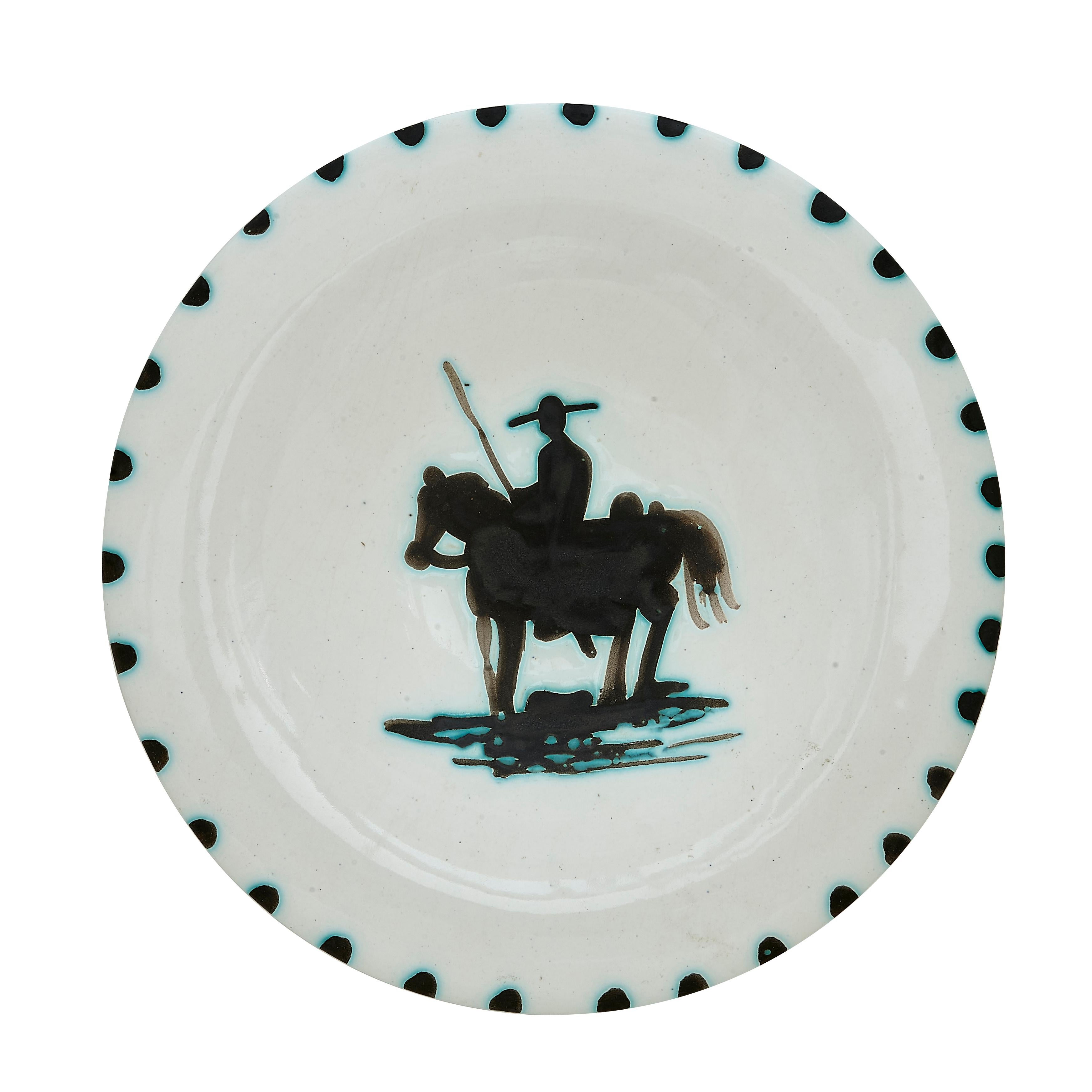 PABLO PICASSO (1881-1973) 
Picador (A. R. 160) 

Terre de faïence plate, 1952, from the edition of 500, incised 'Edition Picasso', partially glazed and painted, with the Edition Picasso and Madoura stamps.