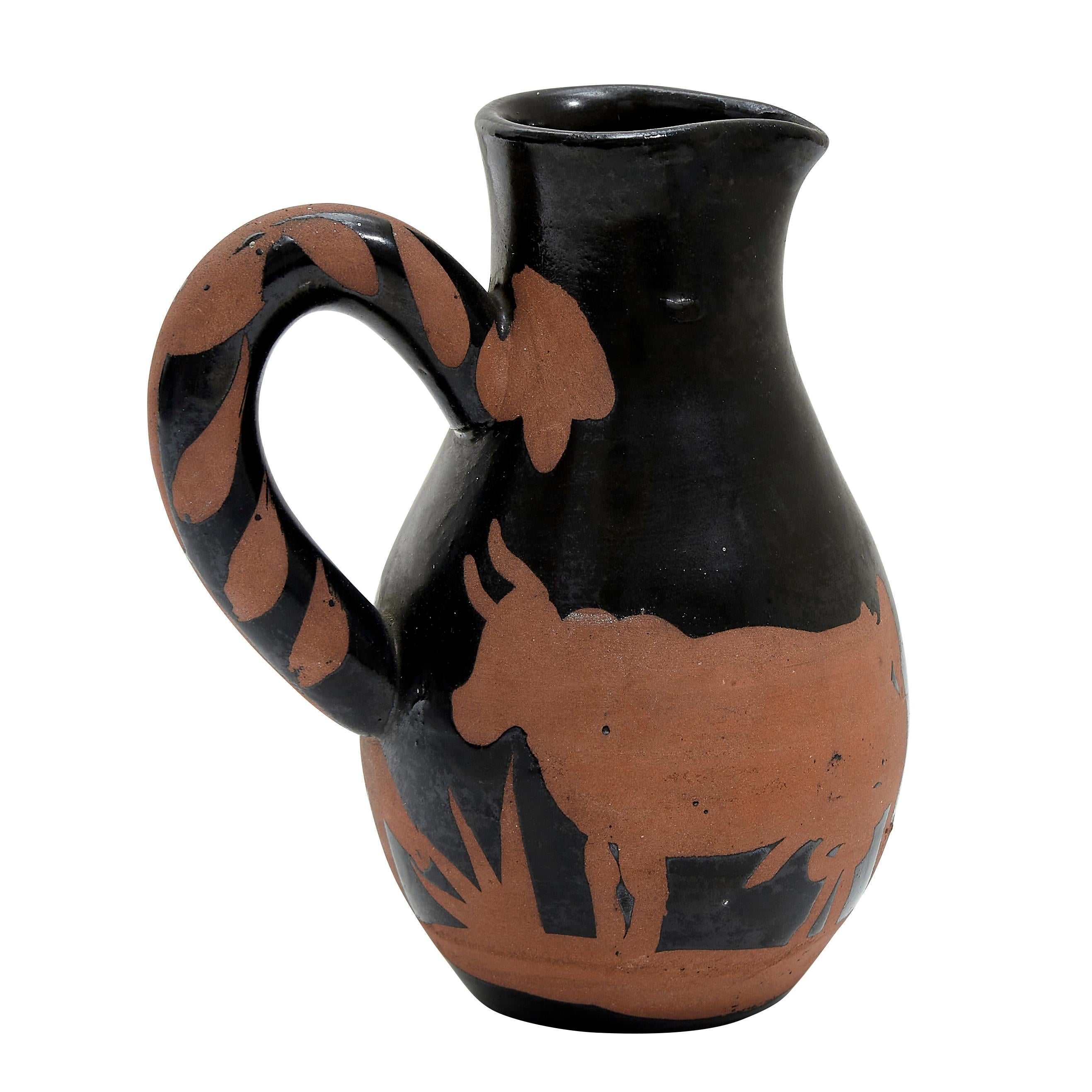PABLO PICASSO (1881-1973) 
Picador (A. R. 162) 

Terre de faïence pitcher, 1952, from the edition of 500, incised 'Edition Picasso' and 'Madoura', partially glazed and painted.