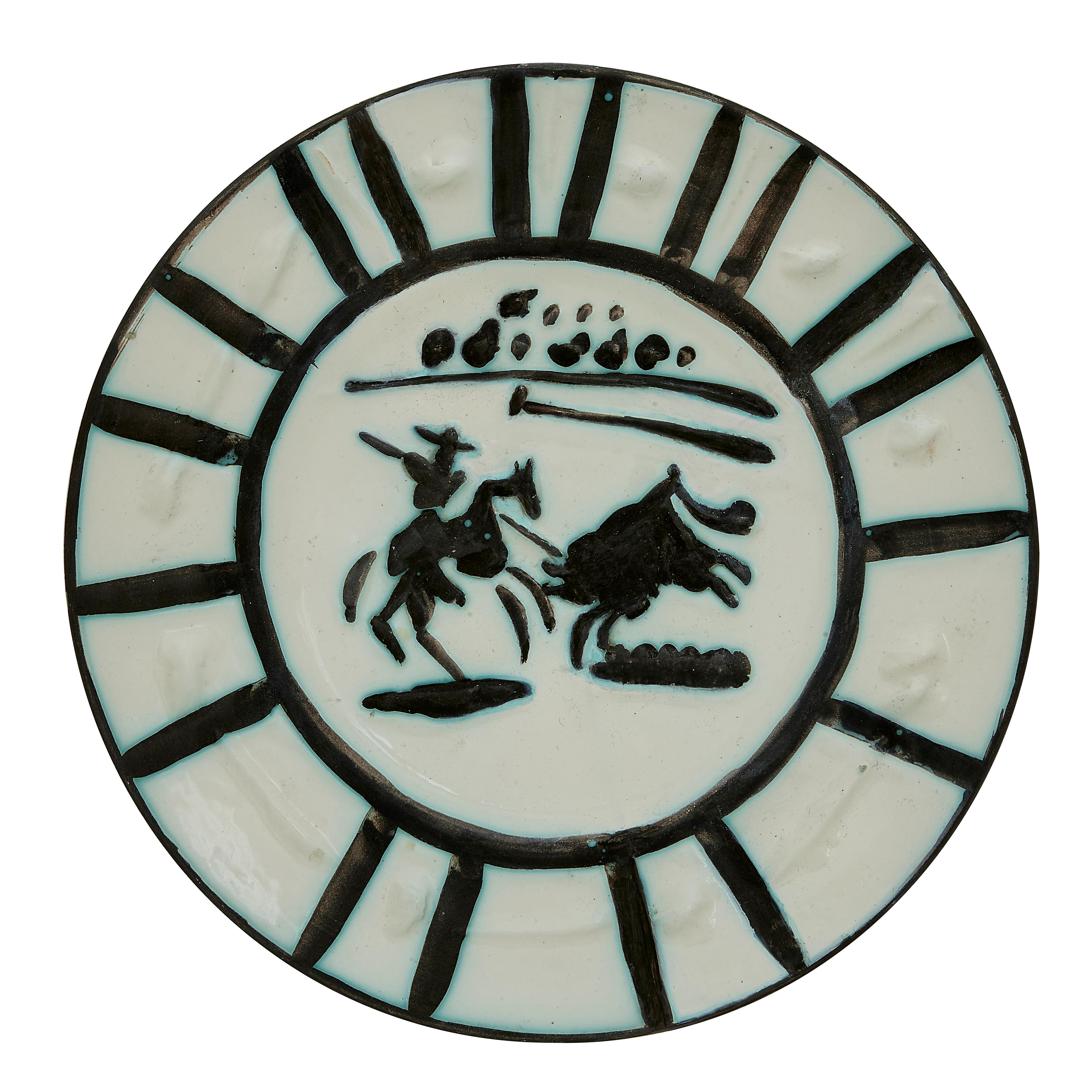 PABLO PICASSO (1881-1973) 
Picador (A. R. 201)

Terre de faïence plate, 1953, numbered 153/200, partially glazed and painted, with the Empreinte Originale de Picasso and Madoura stamps.