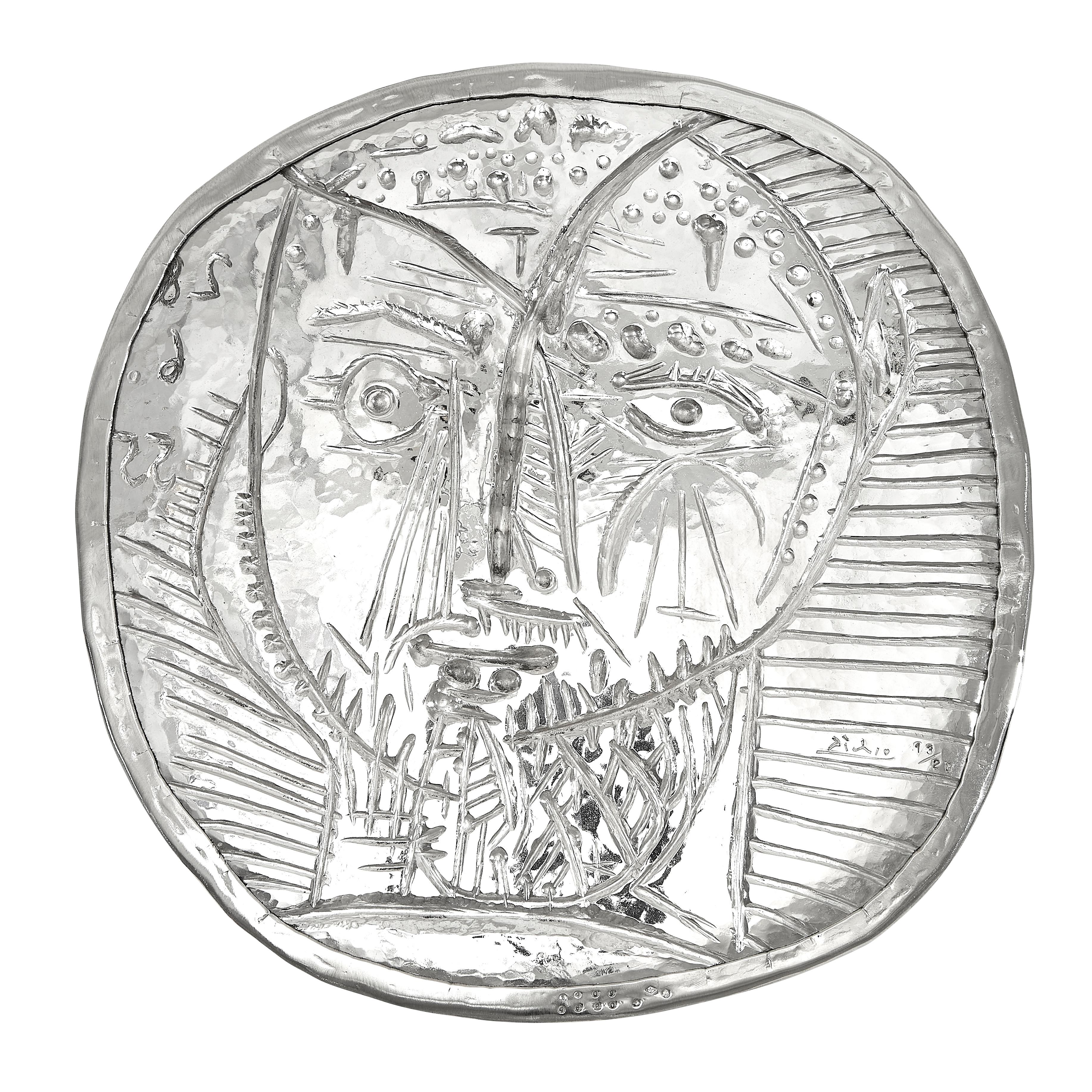 PABLO PICASSO (1881-1973) 
Visage de faune (A. R. 283)

Silver repoussé plate conceived in 1956 and executed in silver by Pierre Hugo in 1977, from an edition of 20 plus two exemplaires d'artiste and two exemplaires d'auteur.