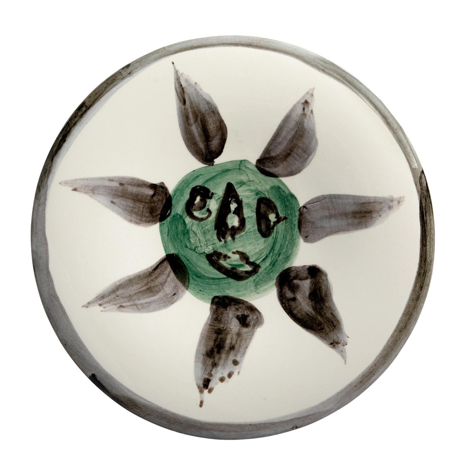 PABLO PICASSO (1881-1973) 
Visage No. 127 (A. R. 478) 

Terre de faïence plate, 1963, numbered 93/150, titled, inscribed 'Edition Picasso' and 'Madoura', glazed and painted.