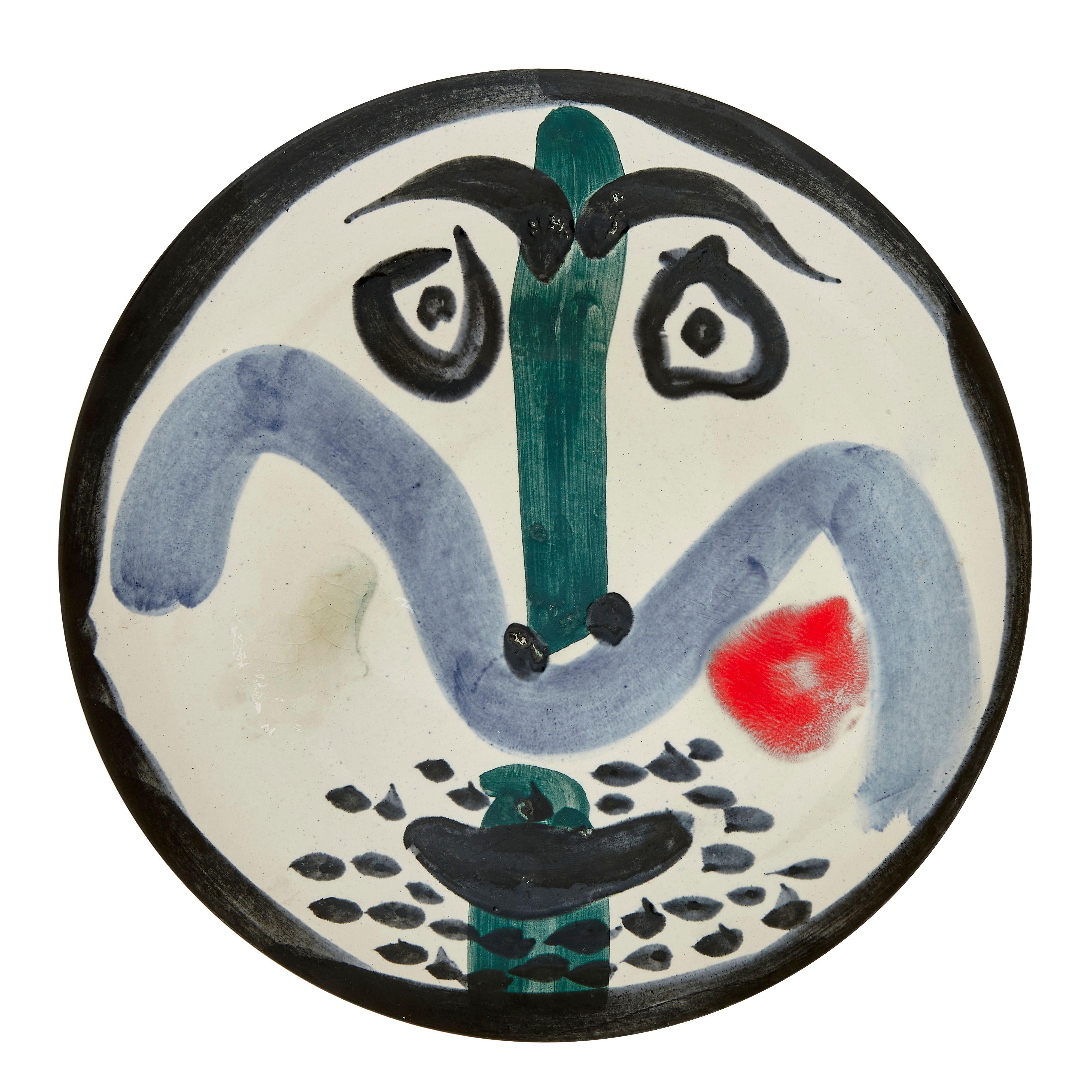 PABLO PICASSO (1881-1973) 
Visage Nr. 130 (A. R. 479) 

Teller "Terre de faïence", farbig bemalt und glasiert, 1963, nummeriert 124/500 und beschriftet "No. 130", "Edition Picasso" und "Madoura".