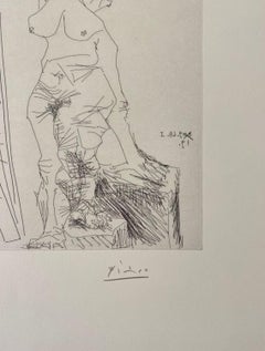 Peintre et modèle qui se cache le visage