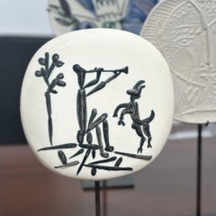 Joueur de flûte et chèvre