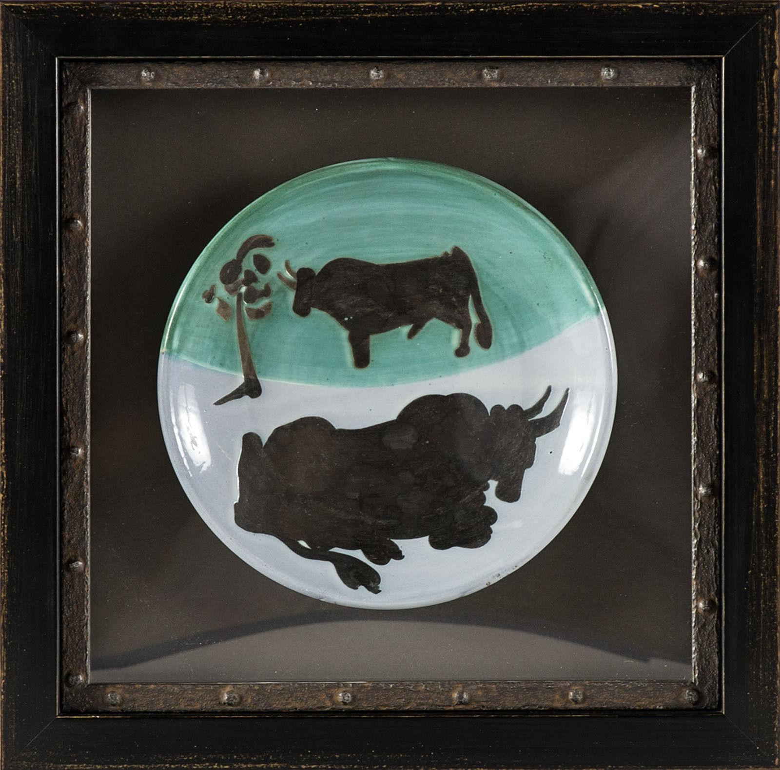 Artist: Pablo Picasso - “Toros”, Madoura Ceramic Plate with Bulls, circa 1953 
Medium: White earthenware ceramic plate with black oxide, colored engobe, and glaze, Design conceived in 1952
Details:: From the edition of 500; with publisher's stamps