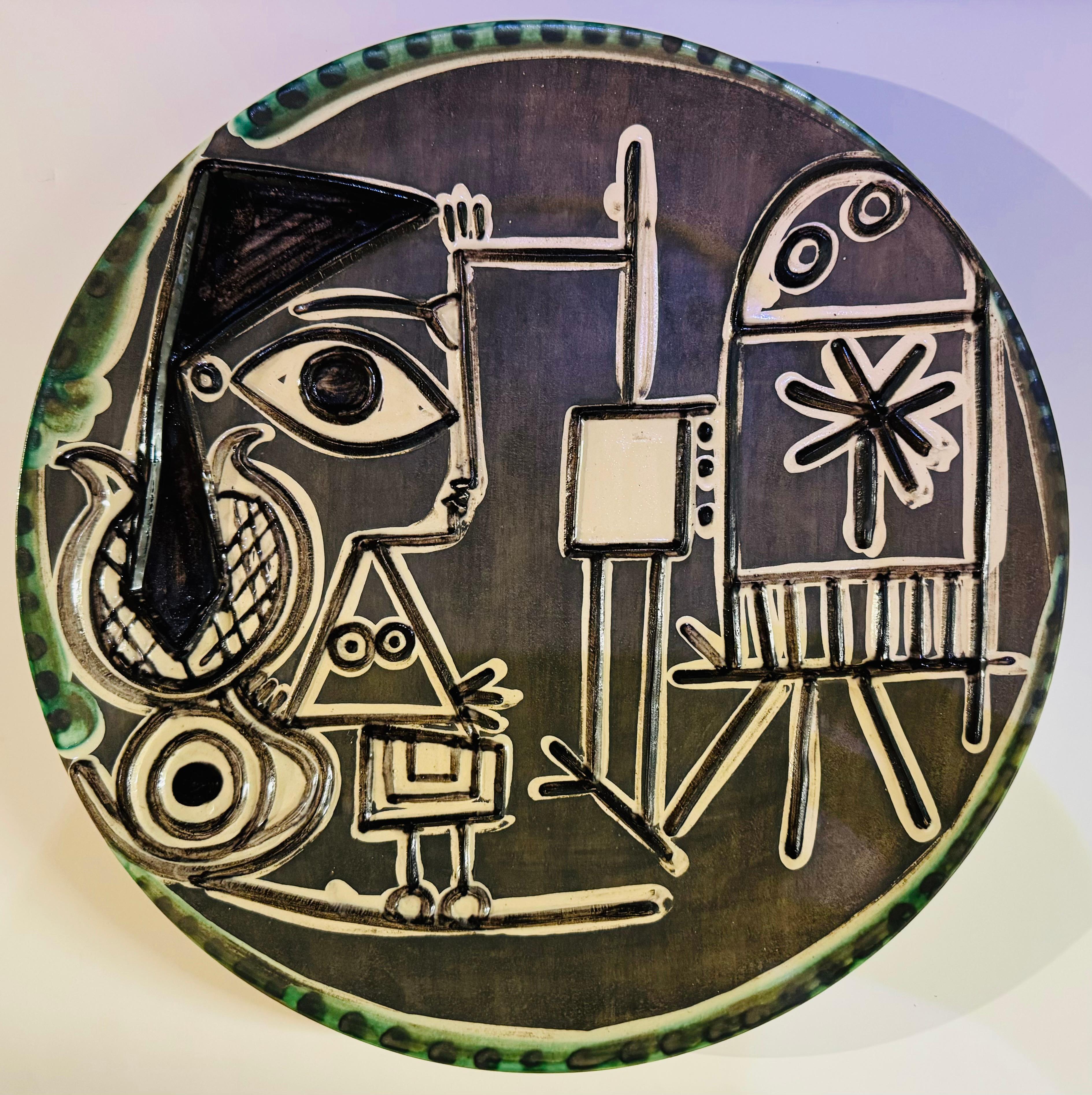 PABLO PICASSO (1881-1973)
Jacqueline au chevalet (A.R. 333)
stamped, marked and numbered 'Madoura Plein Feu / Empreinte Originale de Picasso / F 219 / 199/200' (underneath)
white earthenware ceramic plate with colored engobe and glaze
Diameter: