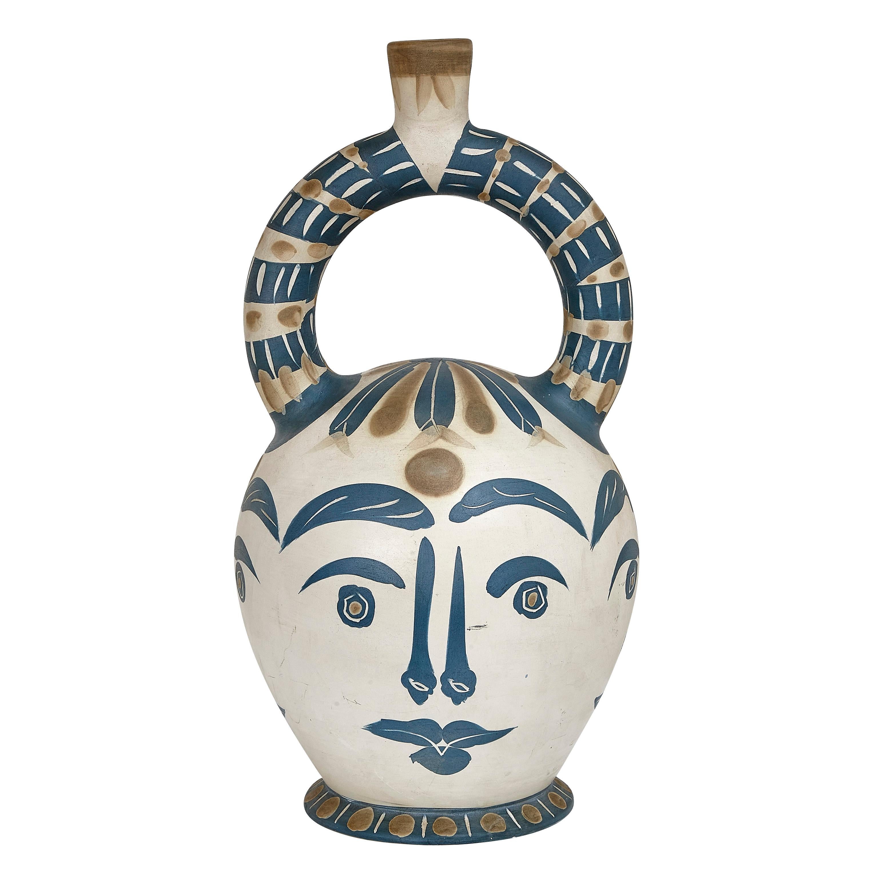 vase aztèque aux quatre visages