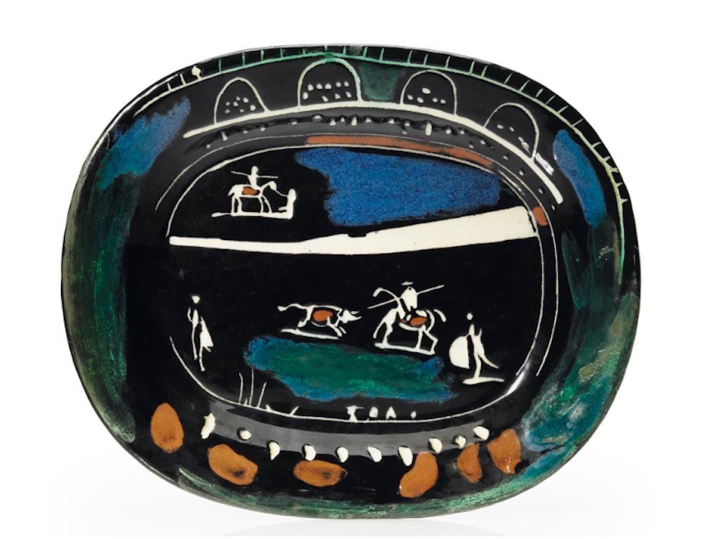 PABLO PICASSO (1881 - 1973)  Corrida verte (A.R. 81)
stamped and marked 'Edition Picasso/Madoura Plein Feu/Empreinte Originale de Picasso' (underneath)
white earthenware ceramic plate, partially engraved, with colored engobe and glaze
Length: 14 3/8