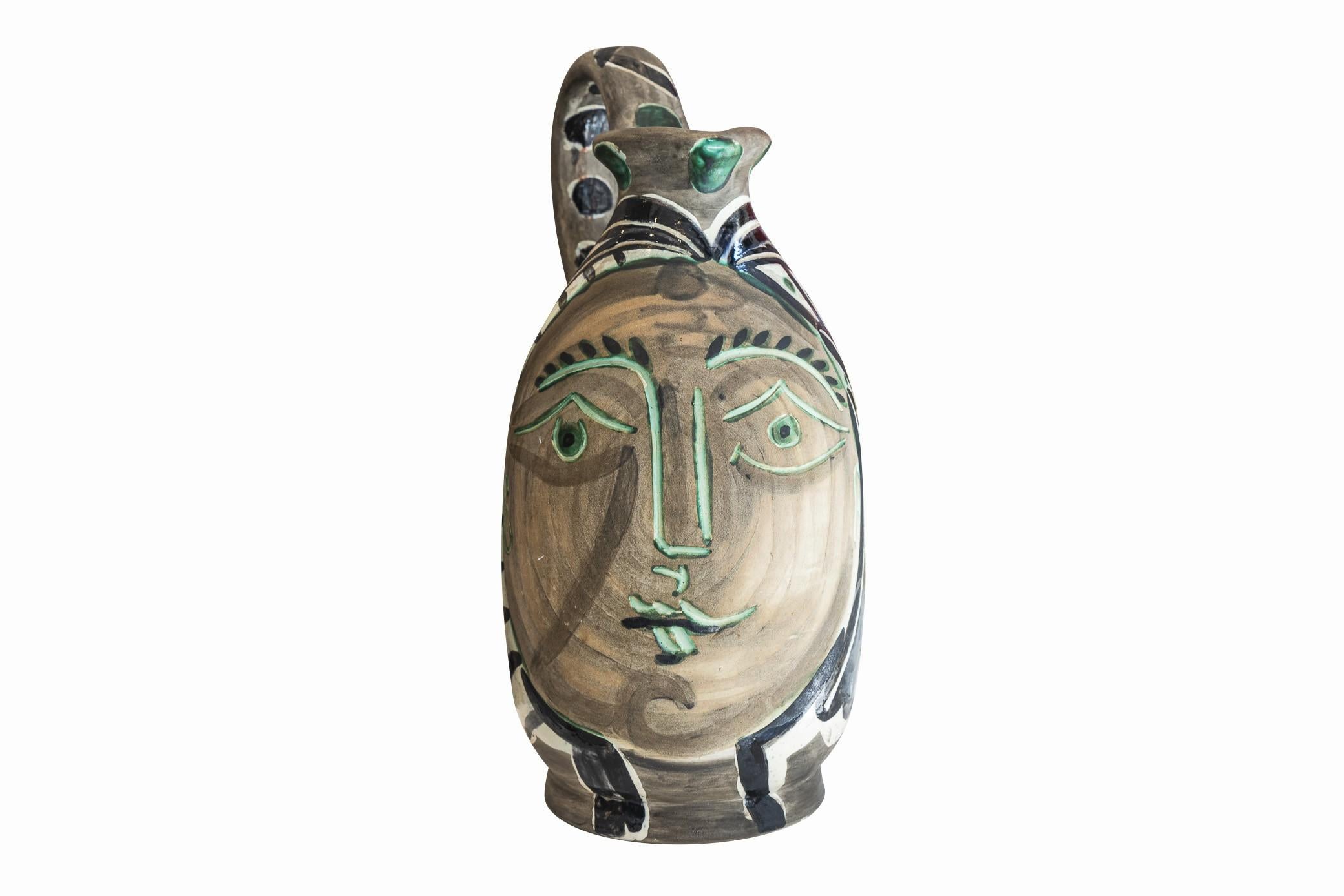Pablo Picasso Madoura, 
"Femme du barbu" ceramic picher, 
1953, 
R.A. white earthenware, 
Black, beige, green and gray patina, 
Edited to 500 copies, 
R. 720.  

Measures: H. 37.5 cm, W. 20.5 cm.