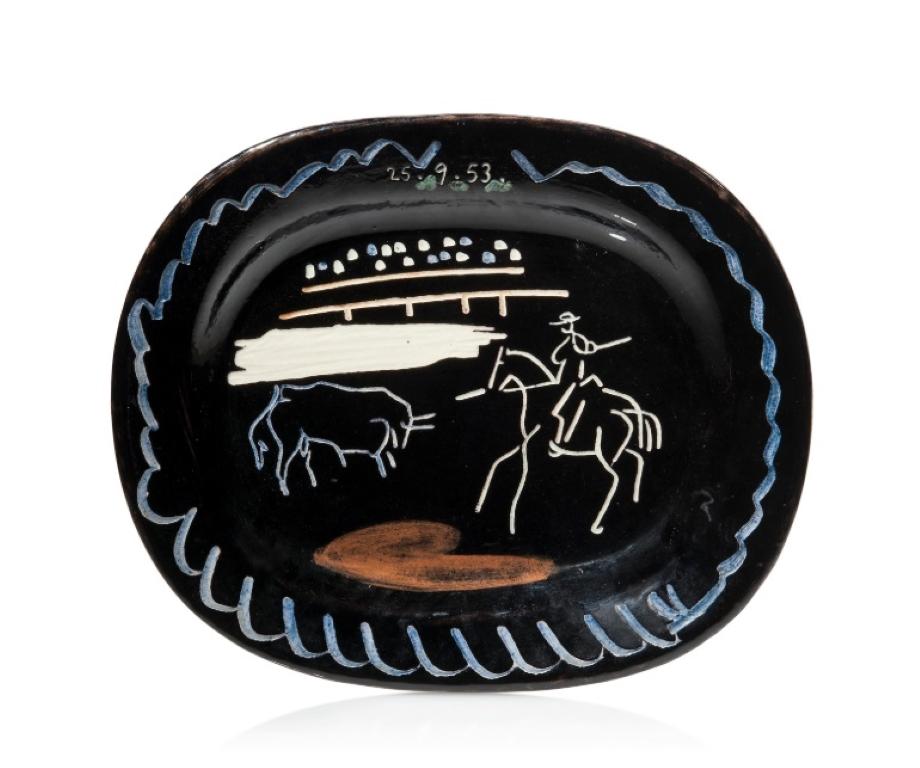 This Picasso Madoura glazed ceramic plate, 'Corrida sur fond noir,' Ramie 198 is made of white earthenware clay, partially engraved, with coloured engobe and glaze. It is executed from an edition of 500, stamped and marked 'Edition Picasso/Madoura