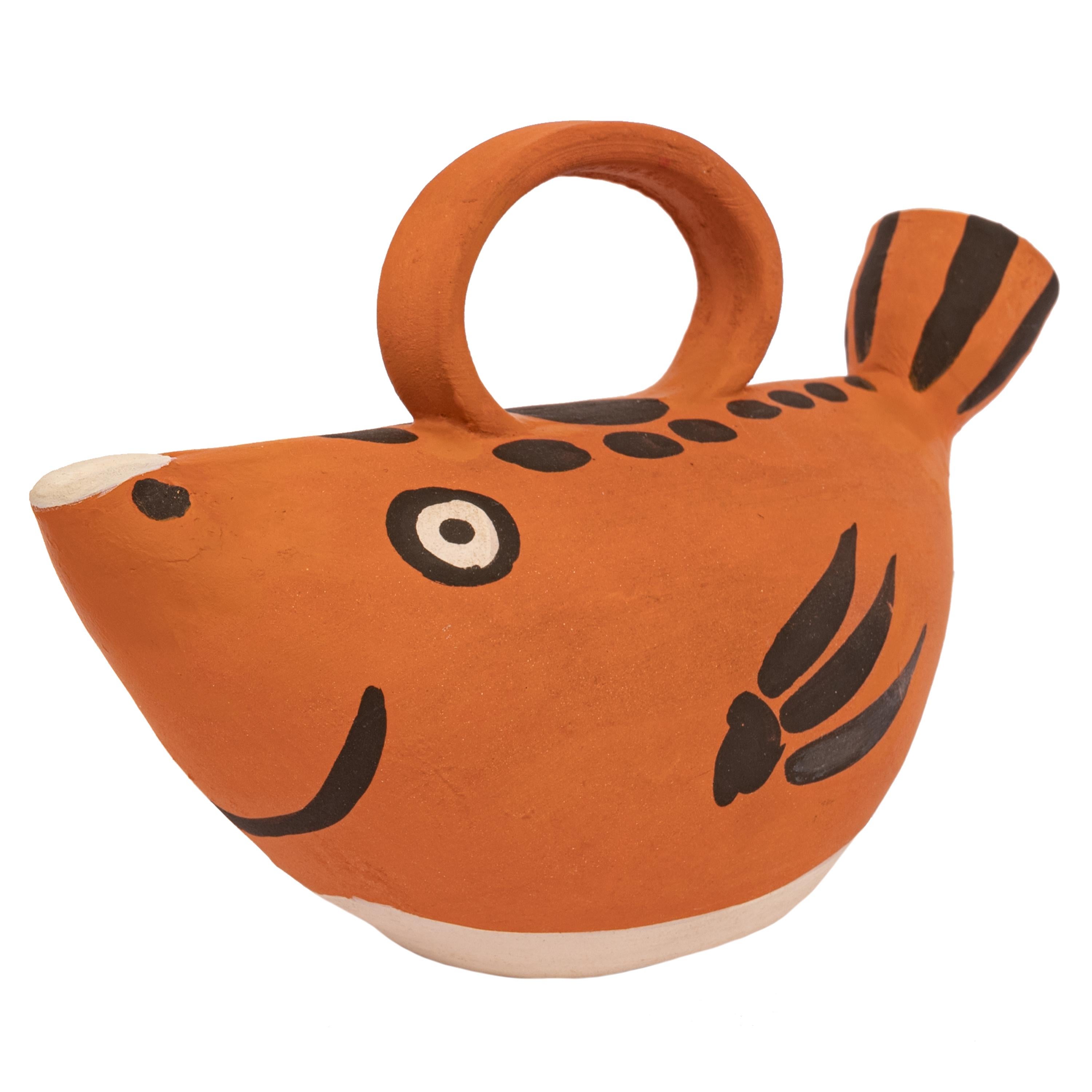 Pablo Picasso (1881-1973), terracotta fish pitcher. Madoura pottery 1952.
This original terracotta fish pitcher was created by Picasso in 1952 and was produced by Madoura Pottery workshop located in Southern France. There were two versions of this