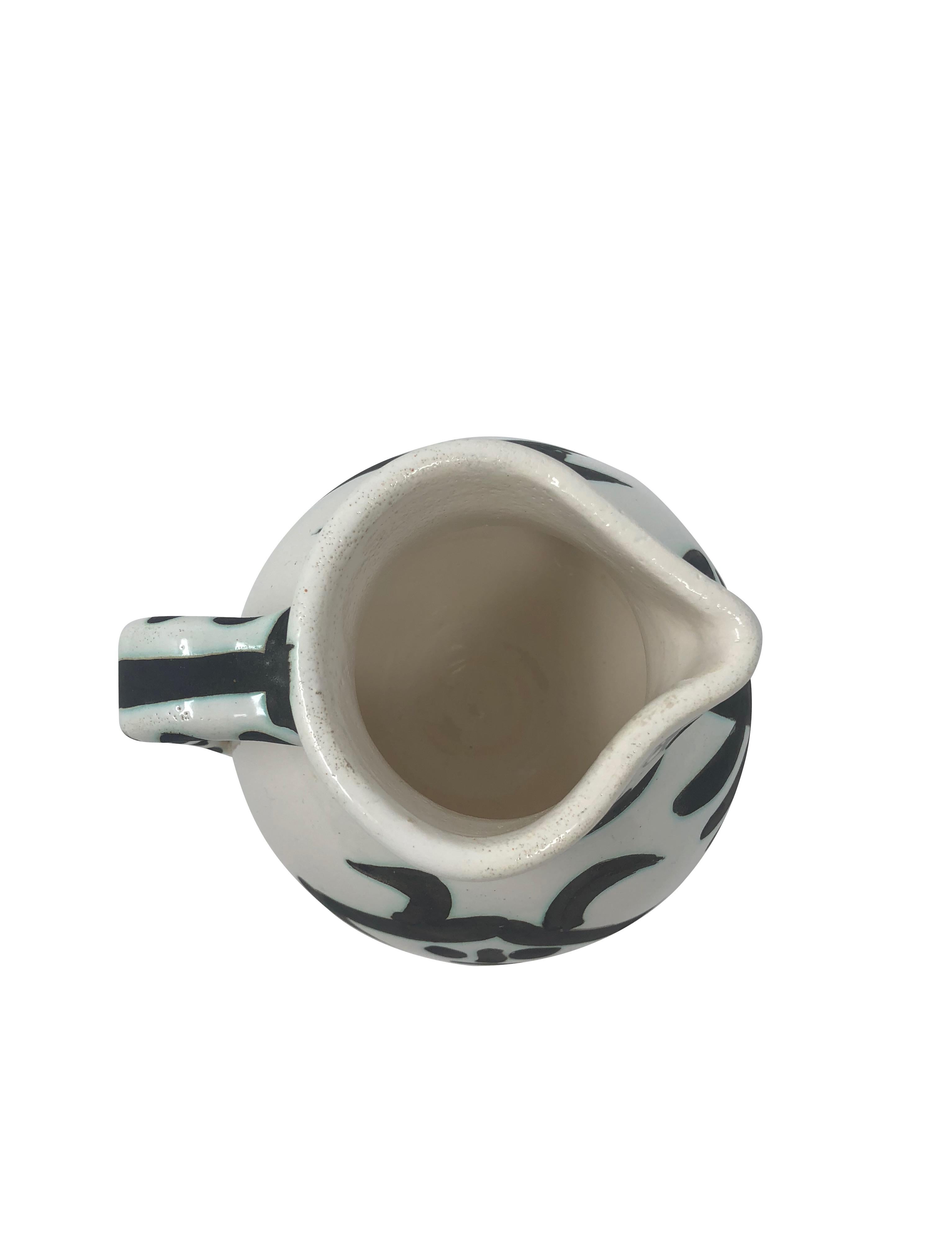 Picasso Madoura Ceramic Pitcher Têtes, Ramié 368 - Abstract Impressionist Sculpture by Pablo Picasso