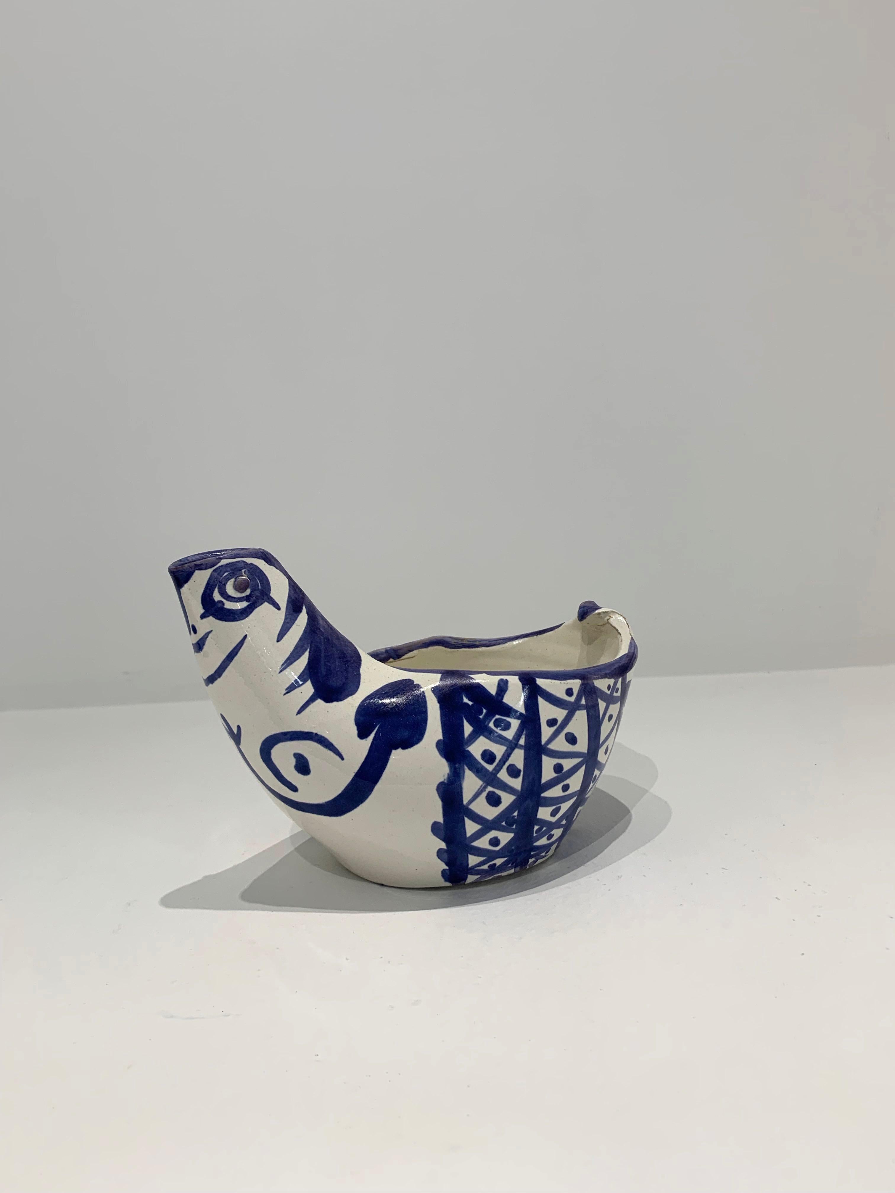 Pichet Poule, by Pablo Picasso, Pitcher, 1950's, Design, Blue, Decoration

Pichet Poule
Ed. 500 pcs
1954
Shaped piece turned in white faience earth with blue oxide decoration on white enamel
13.5 x 17 x 10 cm
Stamped under the base: Madoura plein