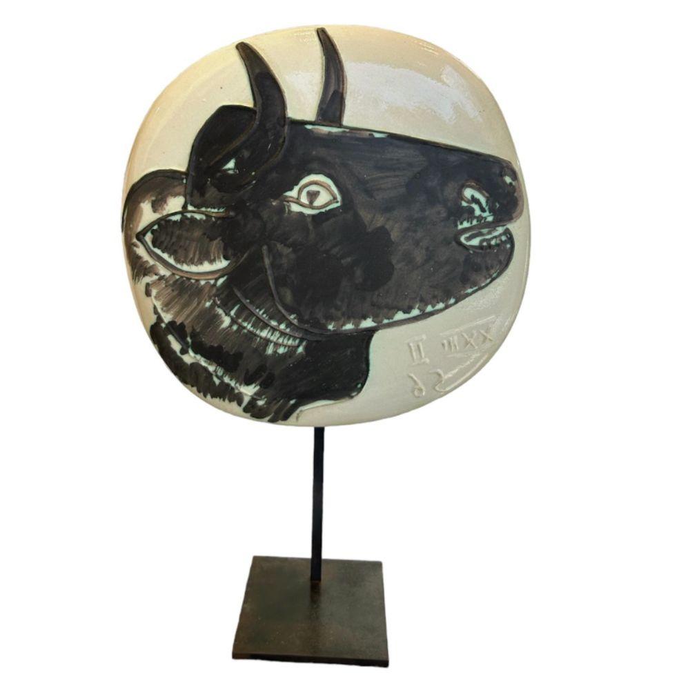 What materials did Picasso use for his sculptures? Questions