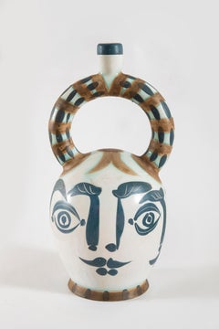 Vase aztèque aux quatre visages, (A.R.401)
