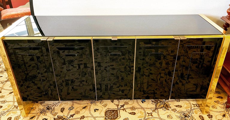 Mid-Century Modern Pace Black Glass and Gold Chrome Credenza Buffet Bar Sideboard Cabinet For Sale