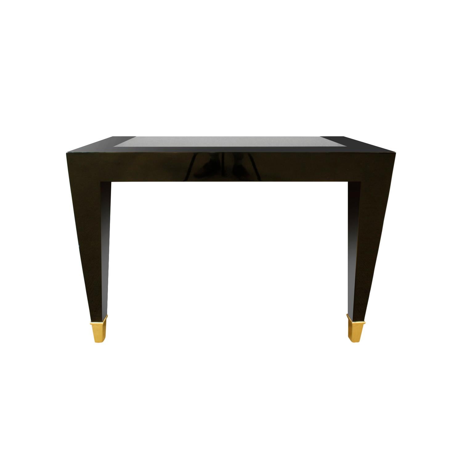 Wall-mounted console table in high gloss black lacquer with brass sabots and inset granite top by Pace Collection, American, 1980s. This console is very elegant.