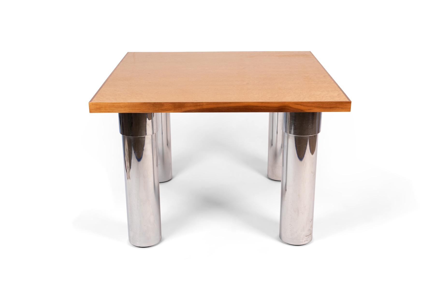 Pace maple burl wood and chrome dining table, circa 1970s featuring stylized tubular chrome finished steel legs.