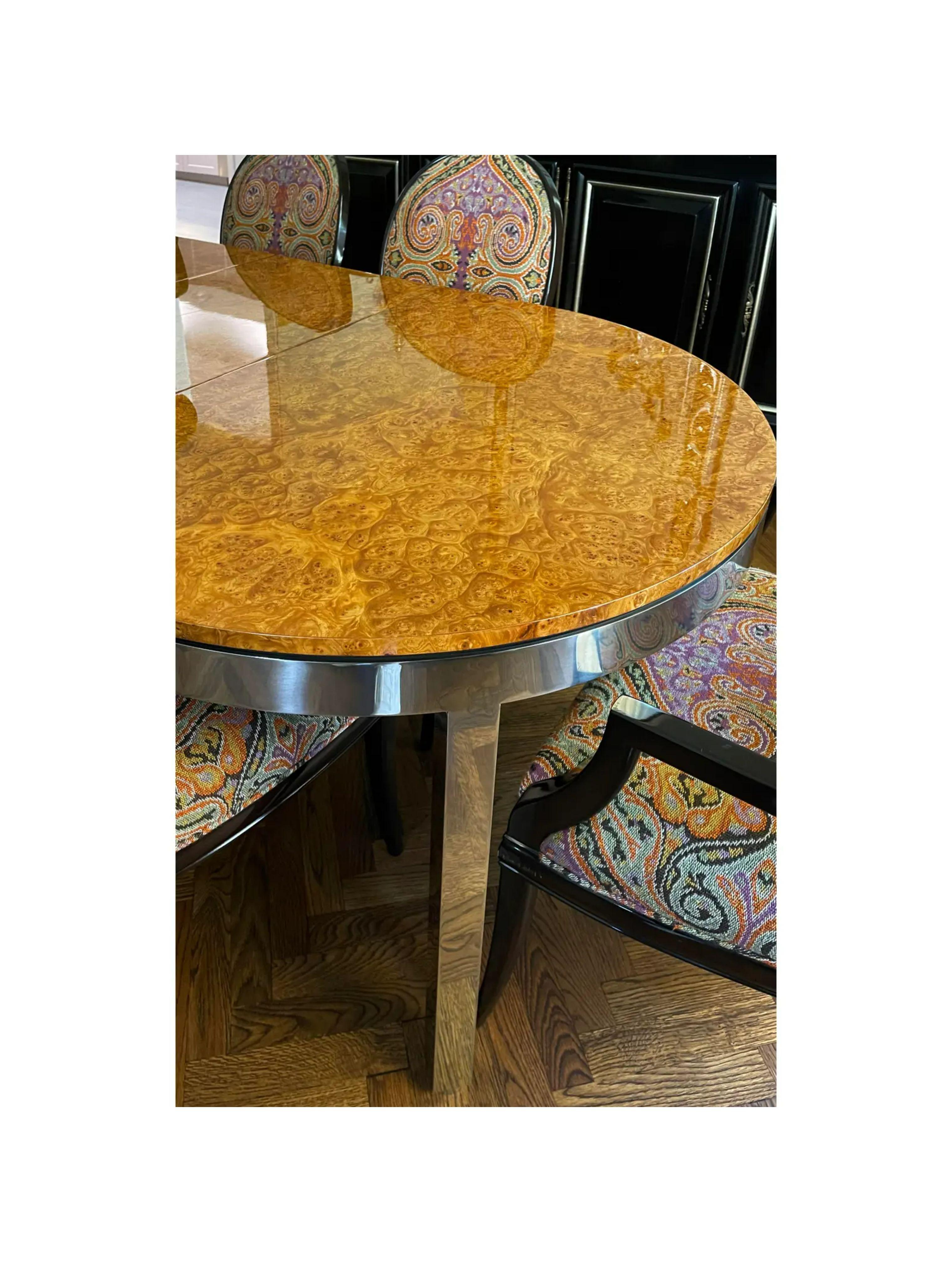 1979’s Pace collection burl wood & chrome dining table. It includes two 18” leaves extending from 60” to 96”. It dates to 1970 and features a stunning burl wood top flanked by a chrome apron and legs. 

Additional information:
Materials: chrome,