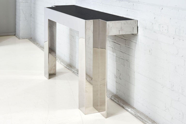 Pace collection chrome and smoked glass console table, 1970. Console table attaches to the wall.