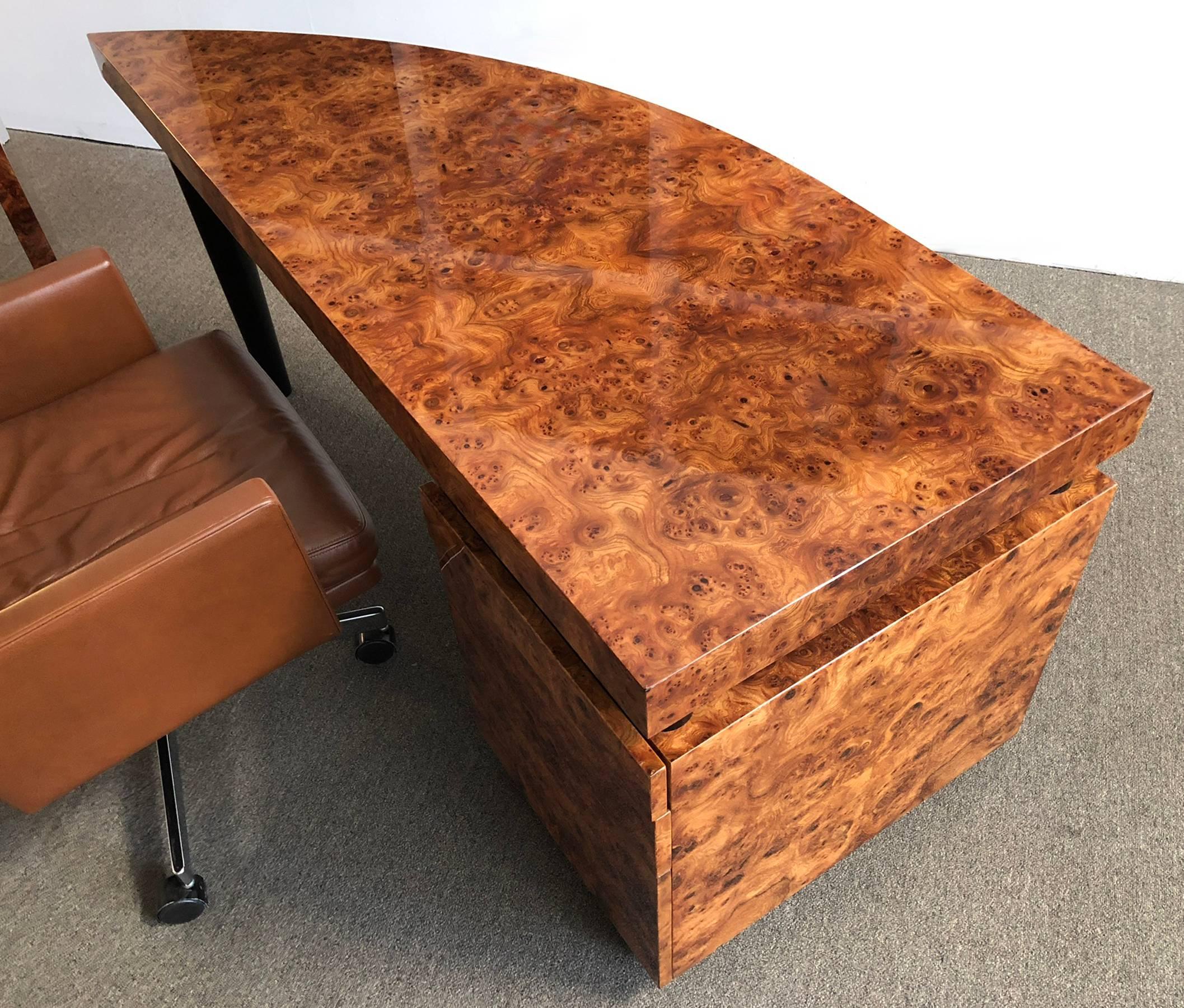 Walnut burl desk with black lacquered leg and details. Designed by Leon Rosen for the Pace Collection. Three drawers.