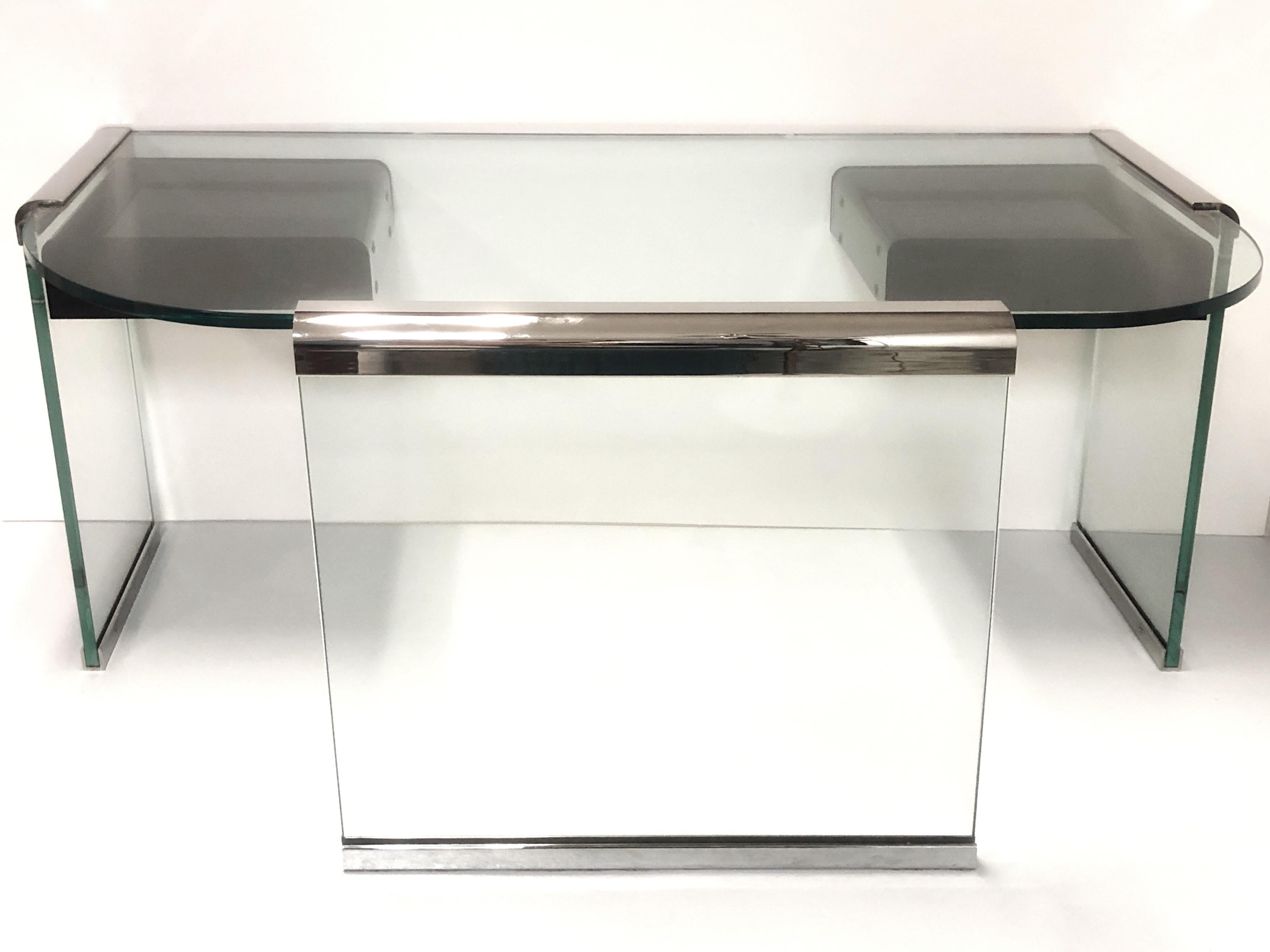 A glass desk by Pace. Waterfall design with 2 floating Lucite drawers. The glass is 3/4