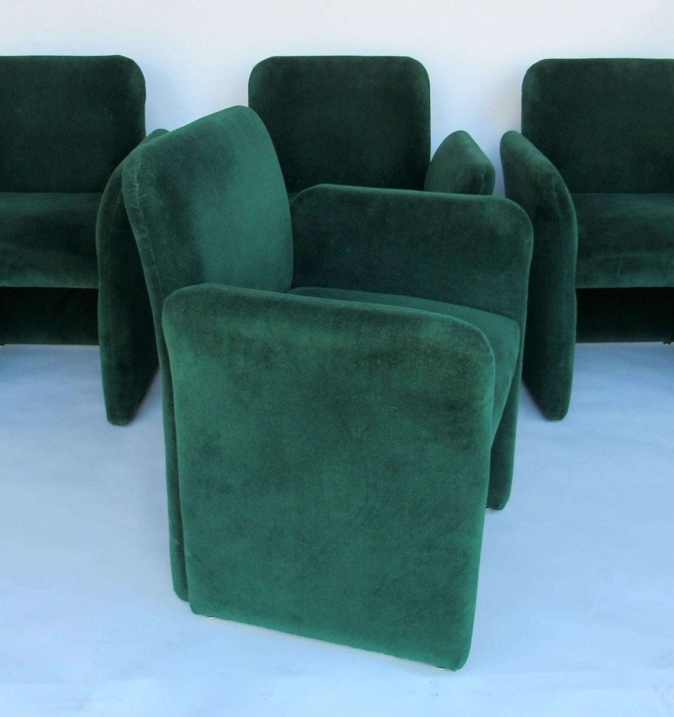 Emerald Green Velvet Upholstered Armchairs by Leon Rosen for Pace 1980s.  Set of Four chairs with gently outwardly curved arms and green velvet upholstery.  
 