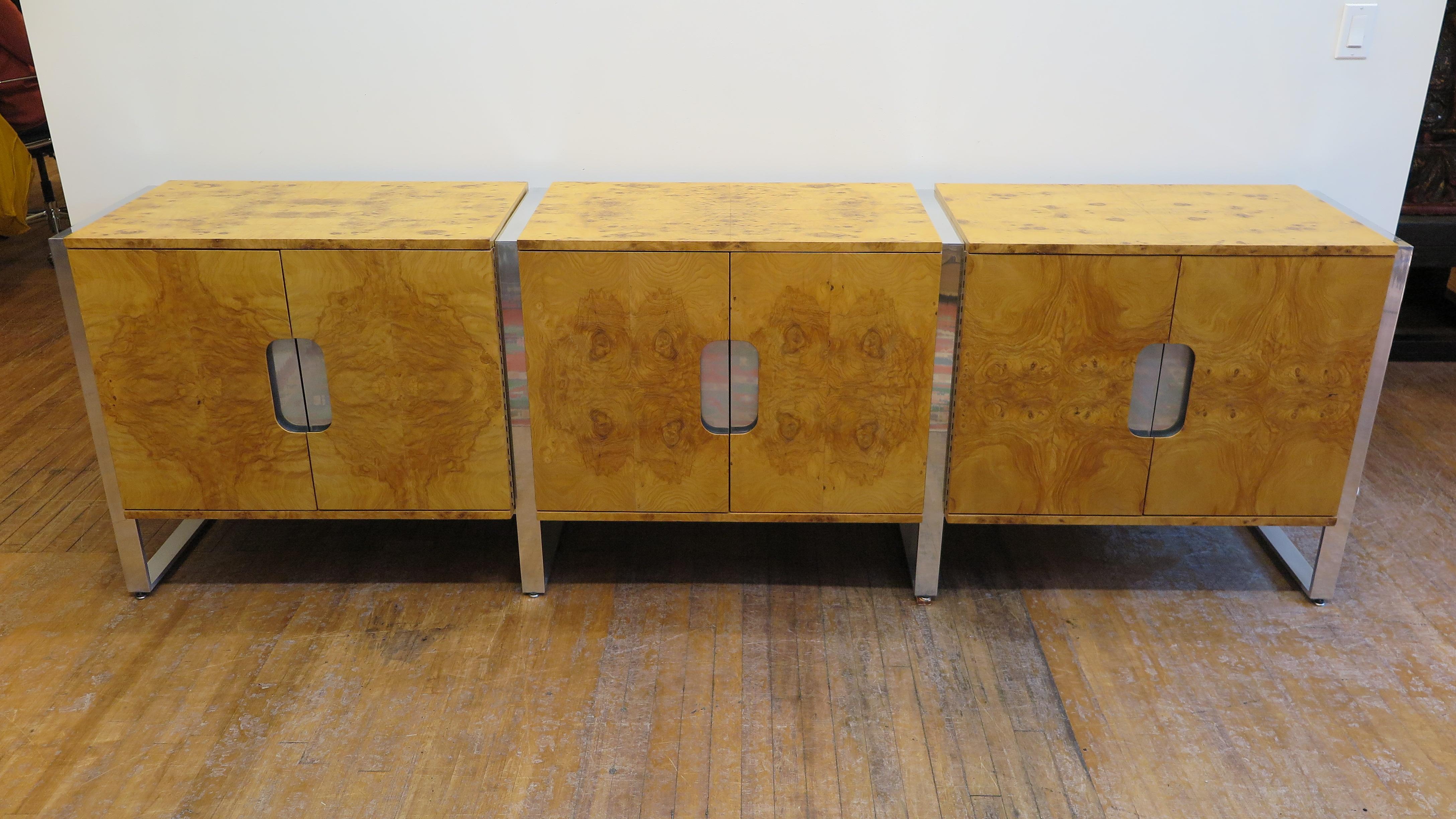 Pace collection sideboard credenza. Walnut burl wood veneered cabinets with shelving set on chrome steel framed legs. In very good condition. Large sideboard with excellent storage. American Modern CA 1970.