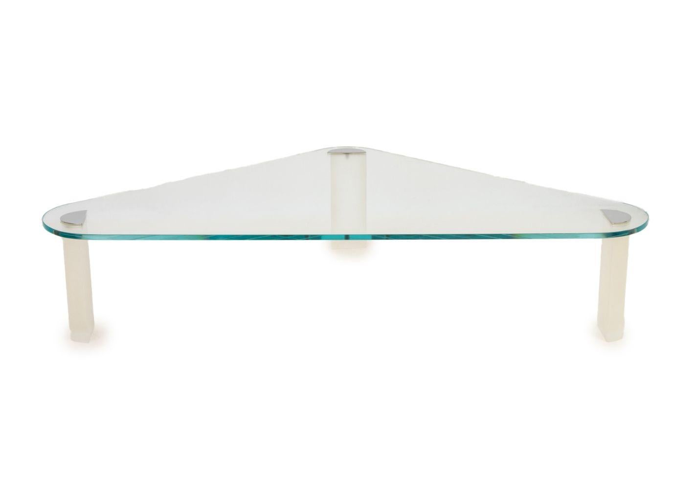 Pace Lucite and Glass Triangular Coffee Table, with chrome accents.

16.5