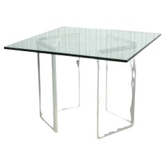 Mesa de comedor moderna de cristal y lucita Pace Manner