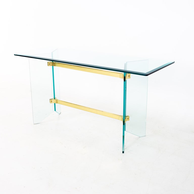 Pace mid century brass and glass foyer entry console table
Table measures: 54 wide x 18 deep x 26.5 inches high

All pieces of furniture can be had in what we call restored vintage condition. That means the piece is restored upon purchase so it’s